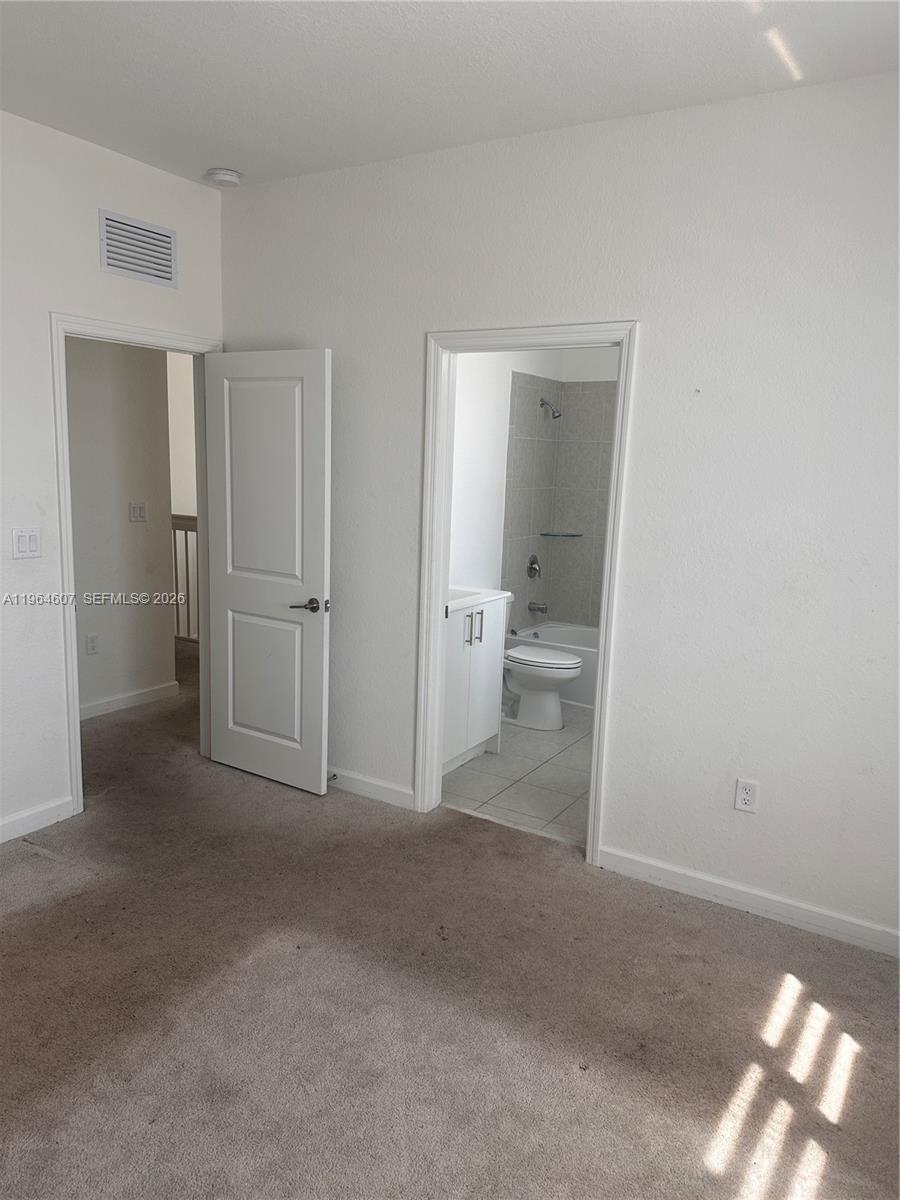 623 Southeast 13th St Circle Homestead, FL 33034 - Photo 8 of 28 a view of a room that has a toilet