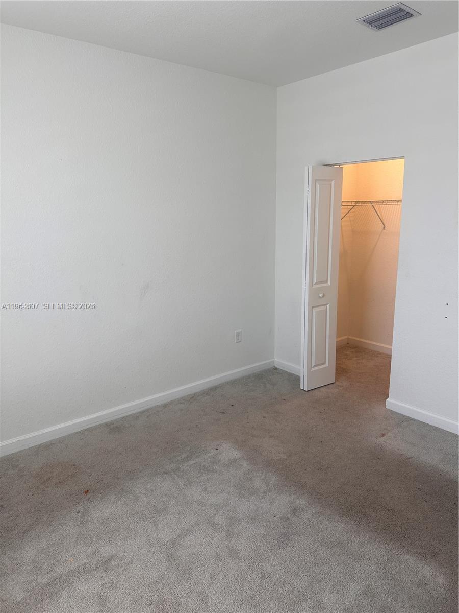 623 Southeast 13th St Circle Homestead, FL 33034 - Photo 9 of 28 a view of an empty room