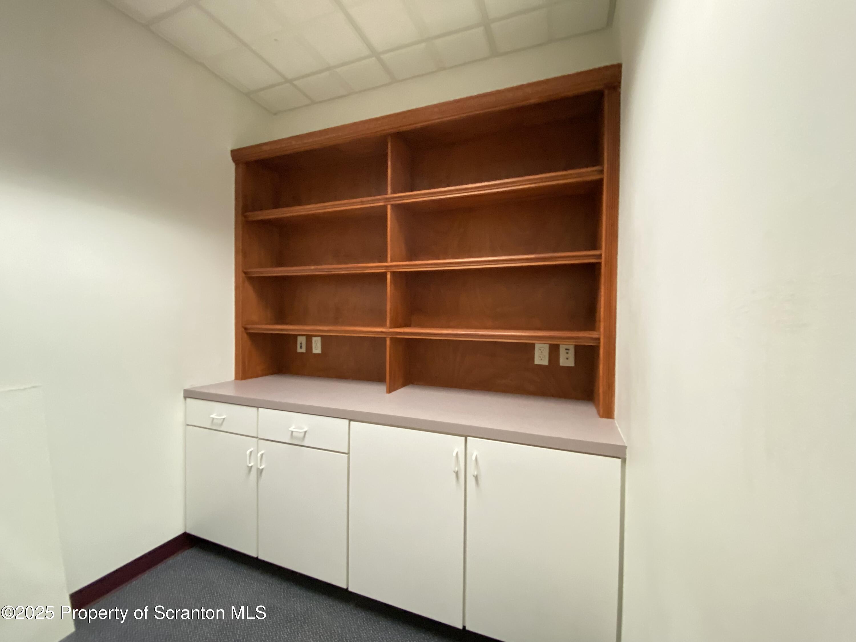 381 North 9th Avenue Scranton, PA 18504 - Photo 11 of 56 a view of a room with racks on the wall