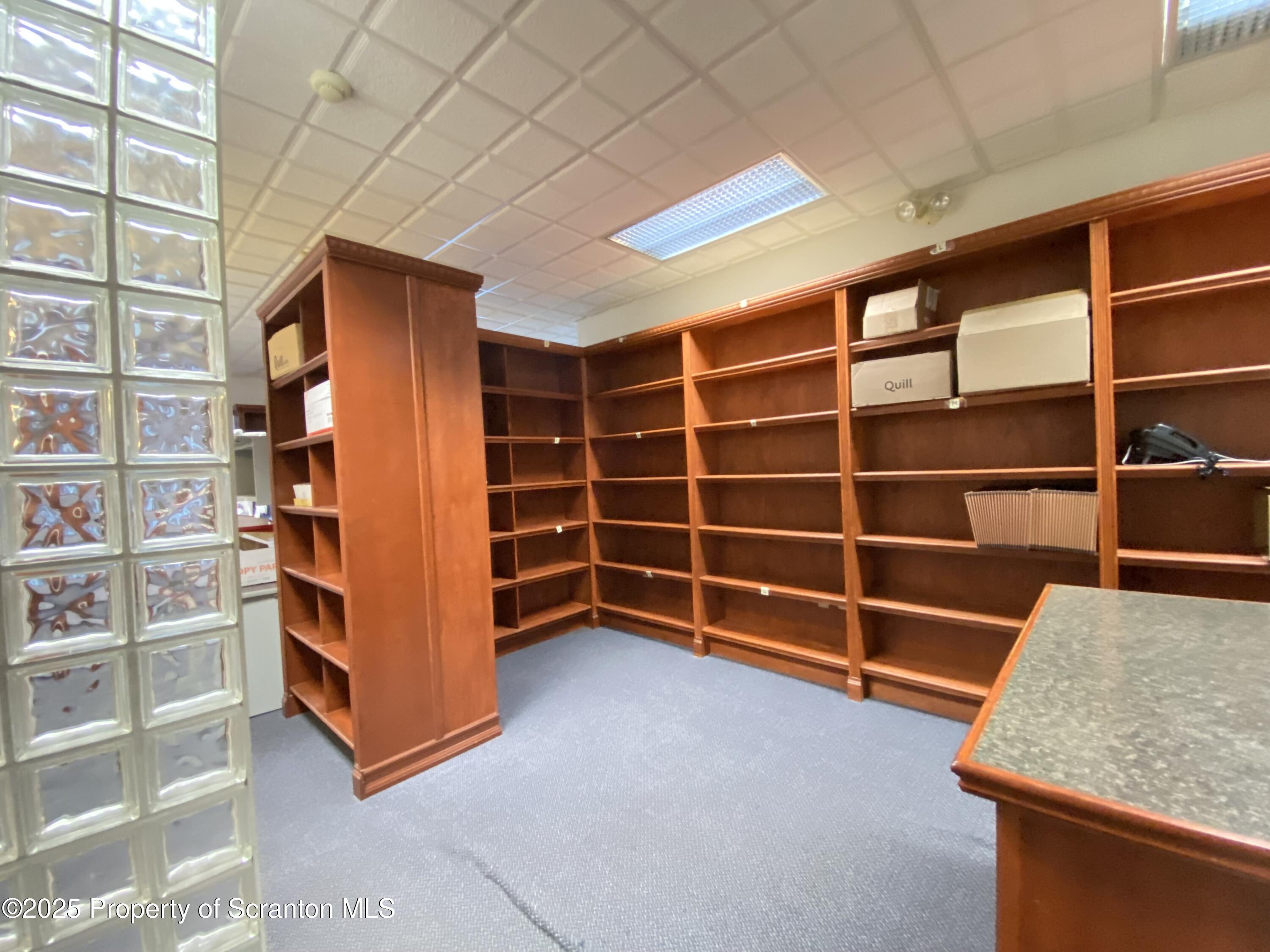 381 North 9th Avenue Scranton, PA 18504 - Photo 12 of 56 a view of an empty room with empty shelves