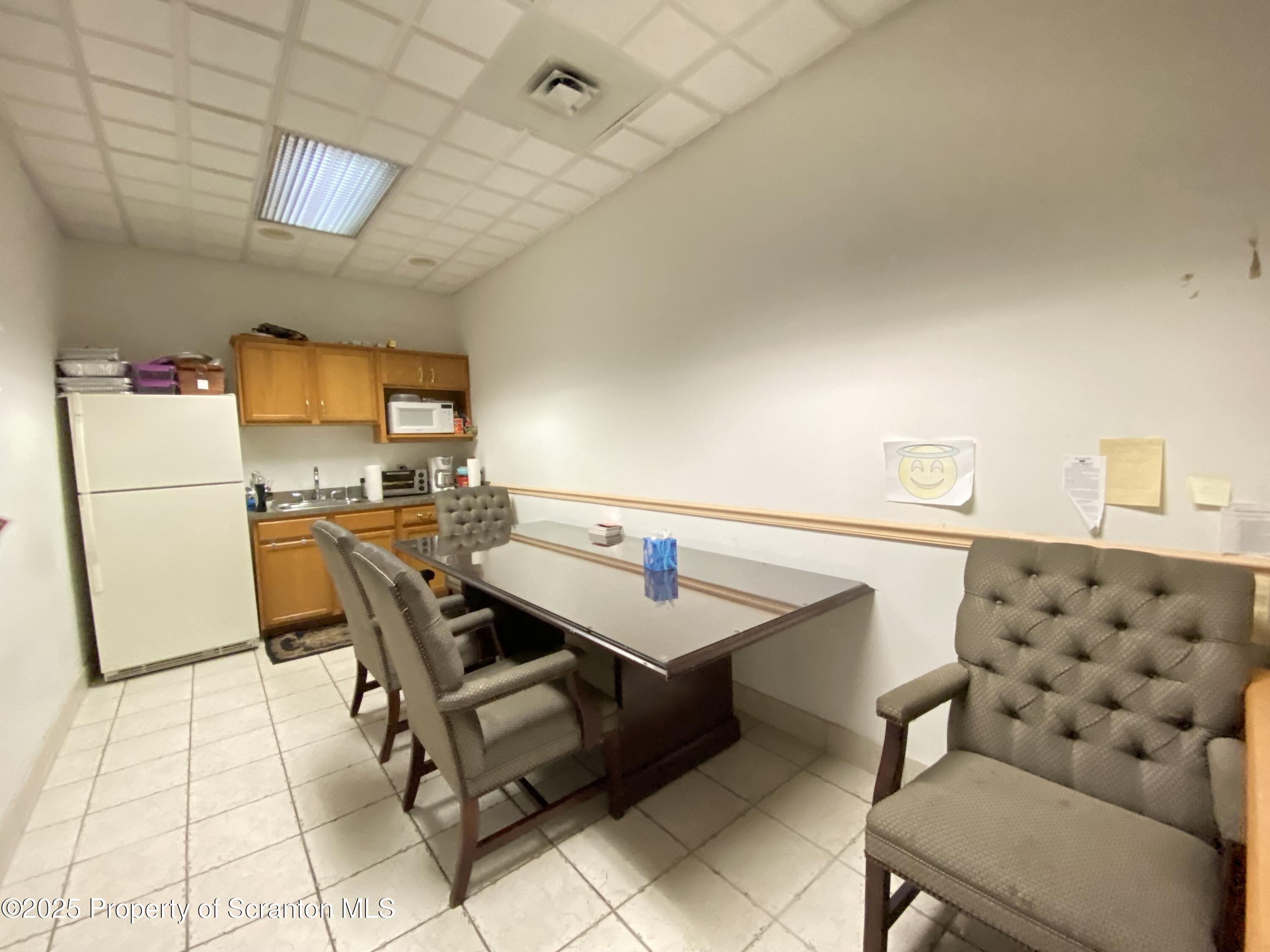 381 North 9th Avenue Scranton, PA 18504 - Photo 20 of 56 a room with furniture and white walls