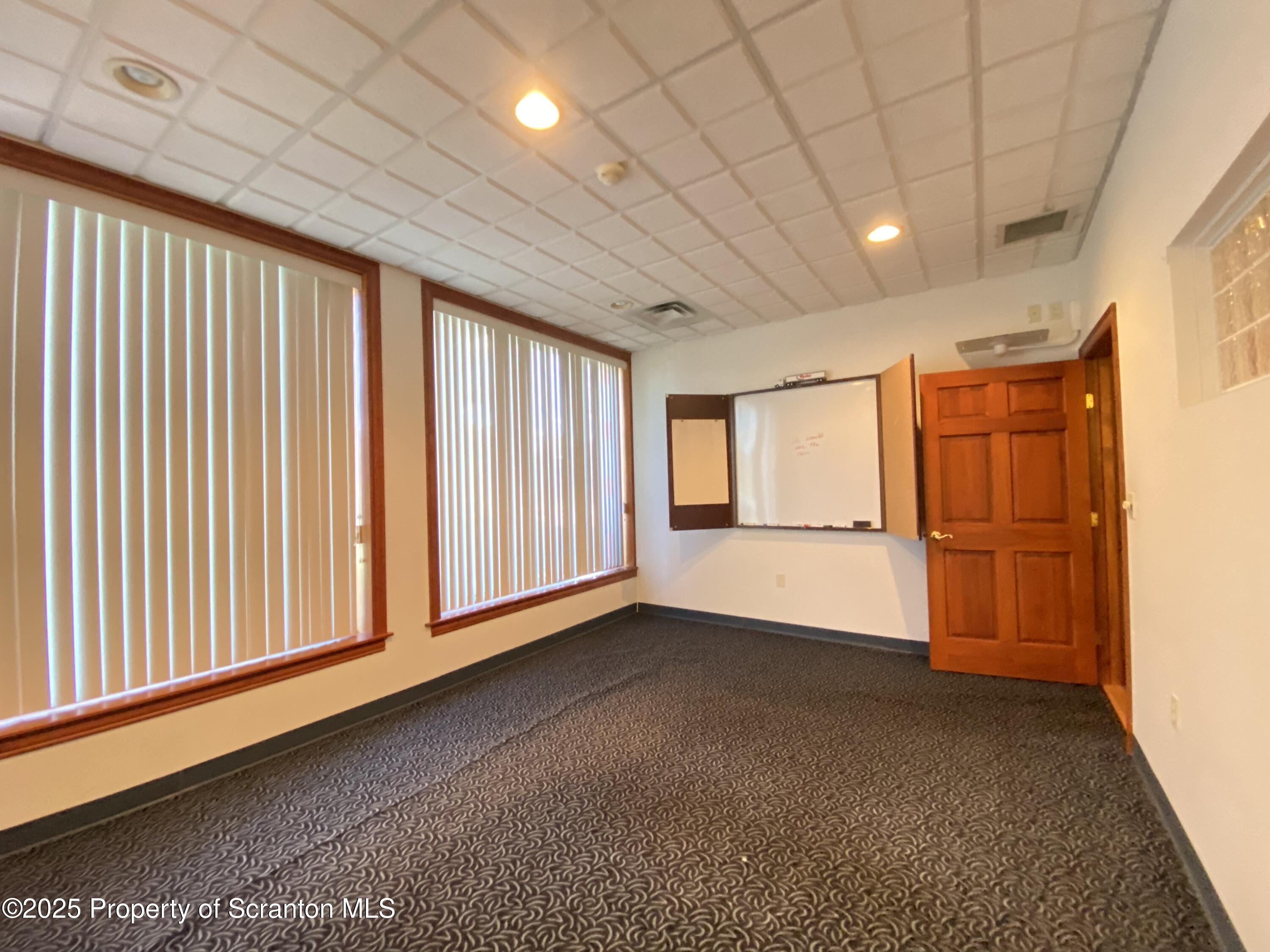 381 North 9th Avenue Scranton, PA 18504 - Photo 27 of 56 a view of an empty room with a window