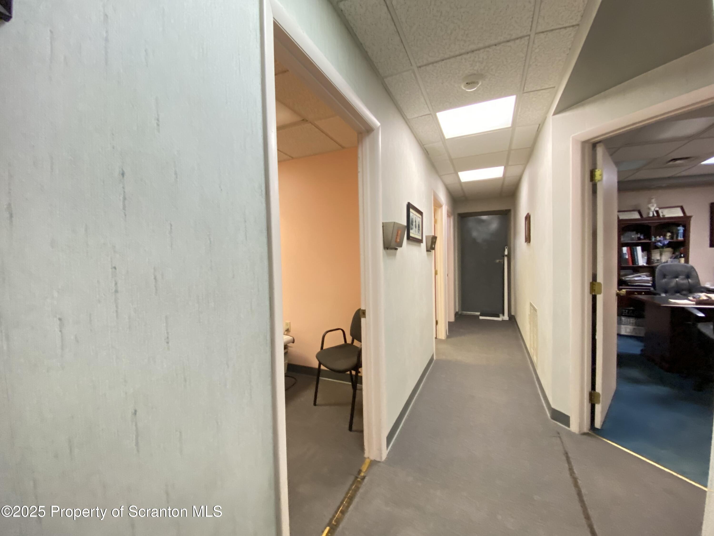 381 North 9th Avenue Scranton, PA 18504 - Photo 36 of 56 a view of a hallway with a furniture and living room