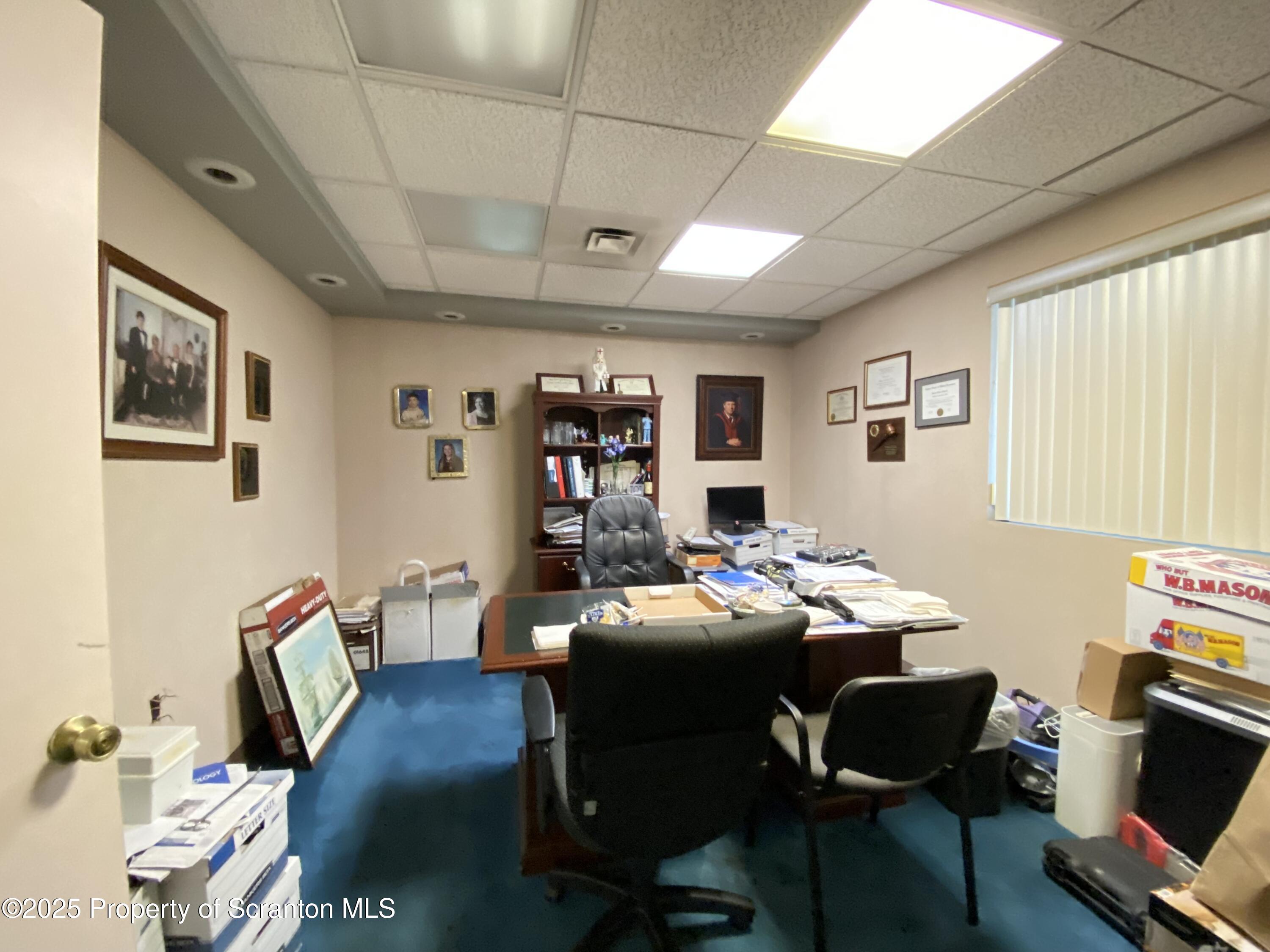 381 North 9th Avenue Scranton, PA 18504 - Photo 37 of 56 a view of a dining room with furniture window and wooden floor