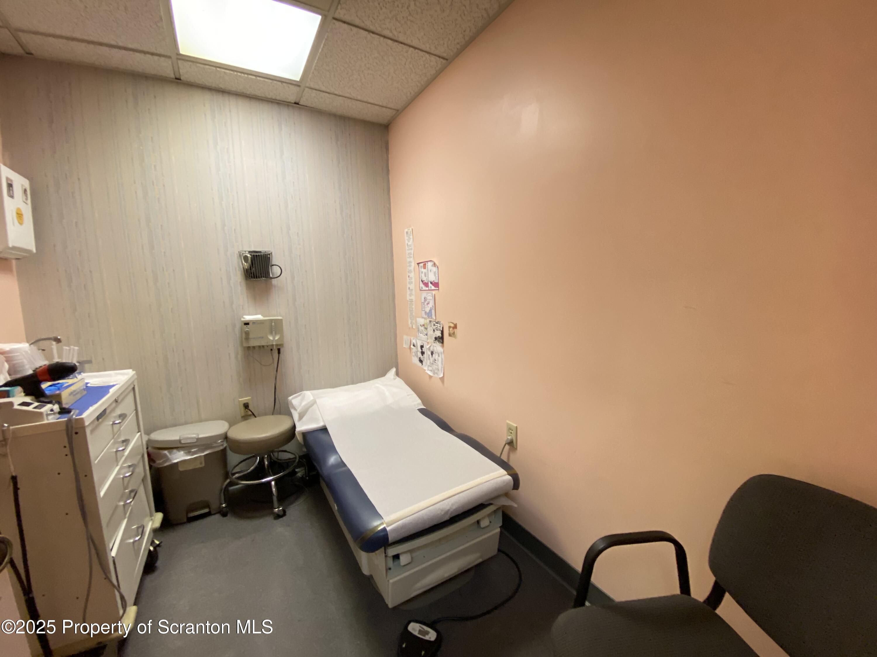 381 North 9th Avenue Scranton, PA 18504 - Photo 38 of 56 a living room with furniture and a window