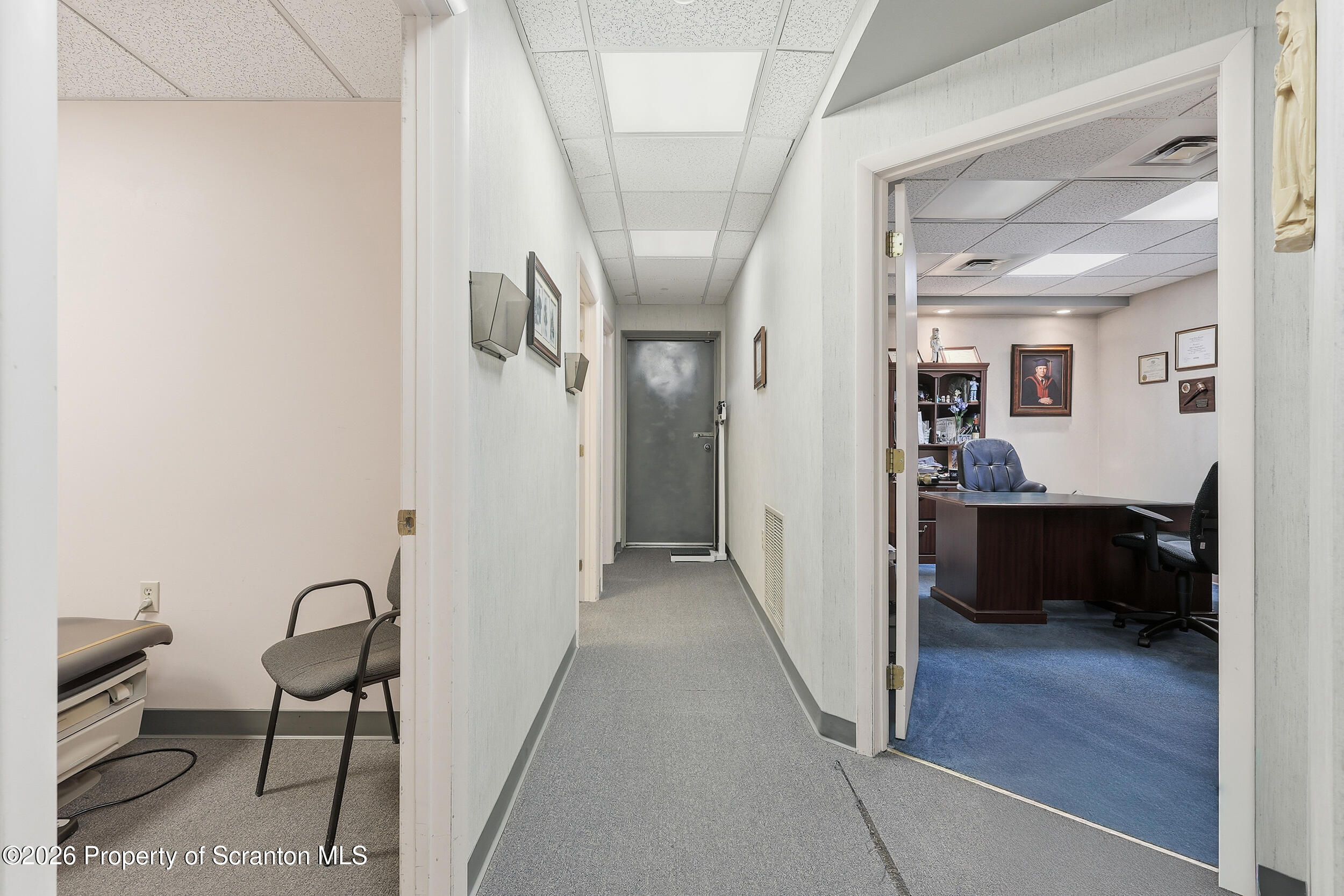 381 North 9th Avenue Scranton, PA 18504 - Photo 39 of 58 a view of a hallway with a livingroom and furniture