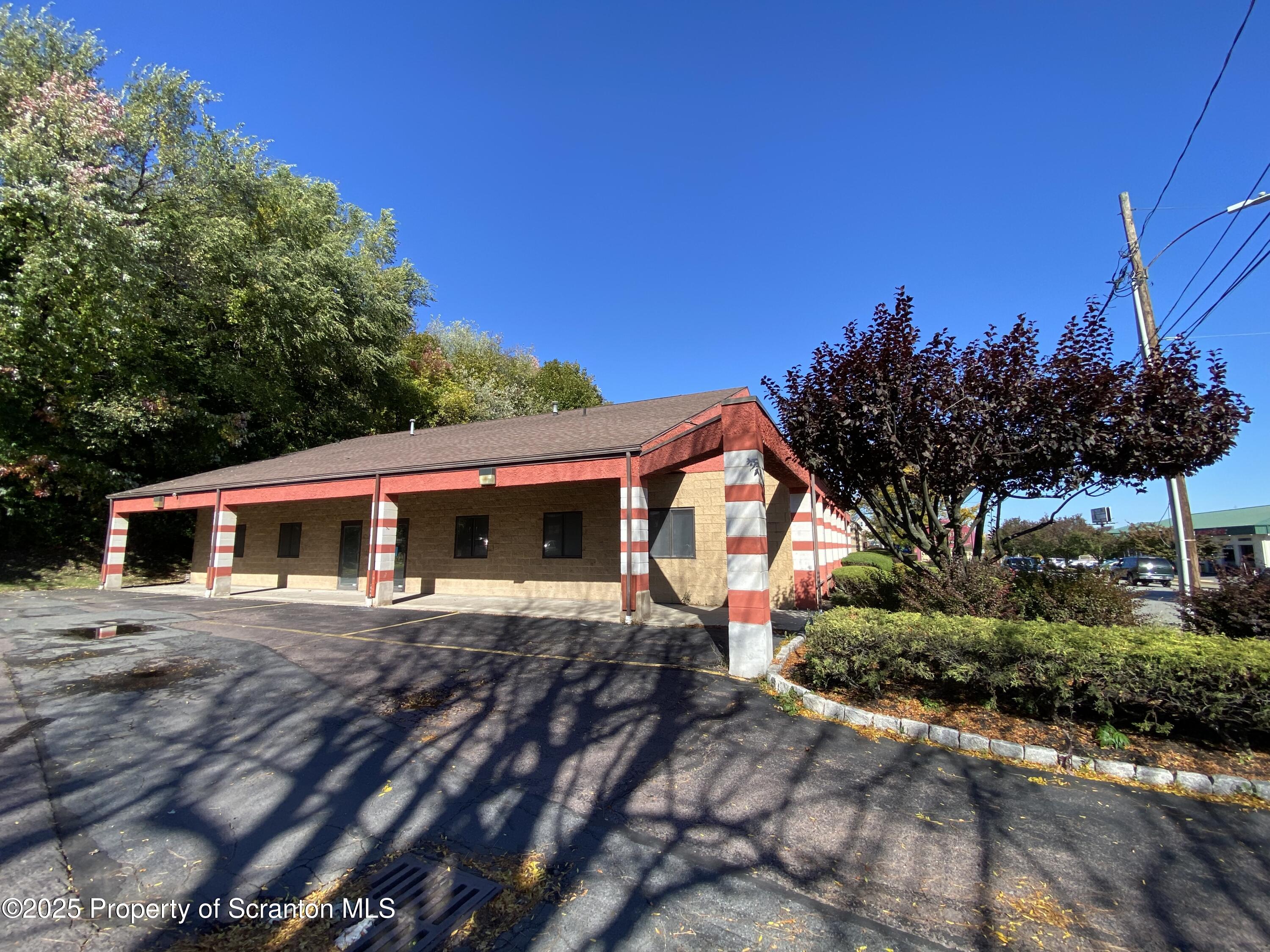 381 North 9th Avenue Scranton, PA 18504 - Photo 45 of 56 a front view of a house with a yard