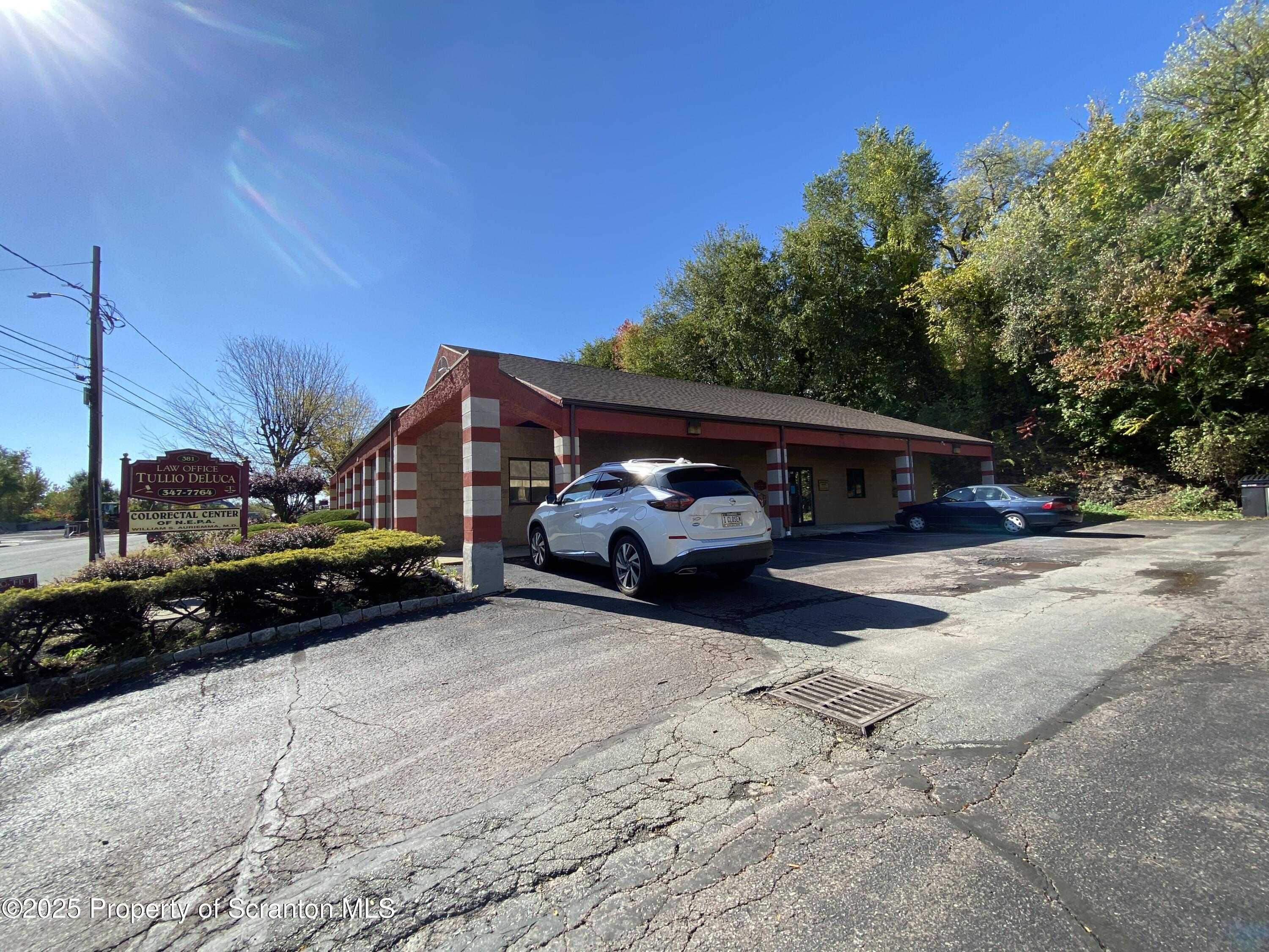 381 North 9th Avenue Scranton, PA 18504 - Photo 48 of 56 a car parked in front of a house