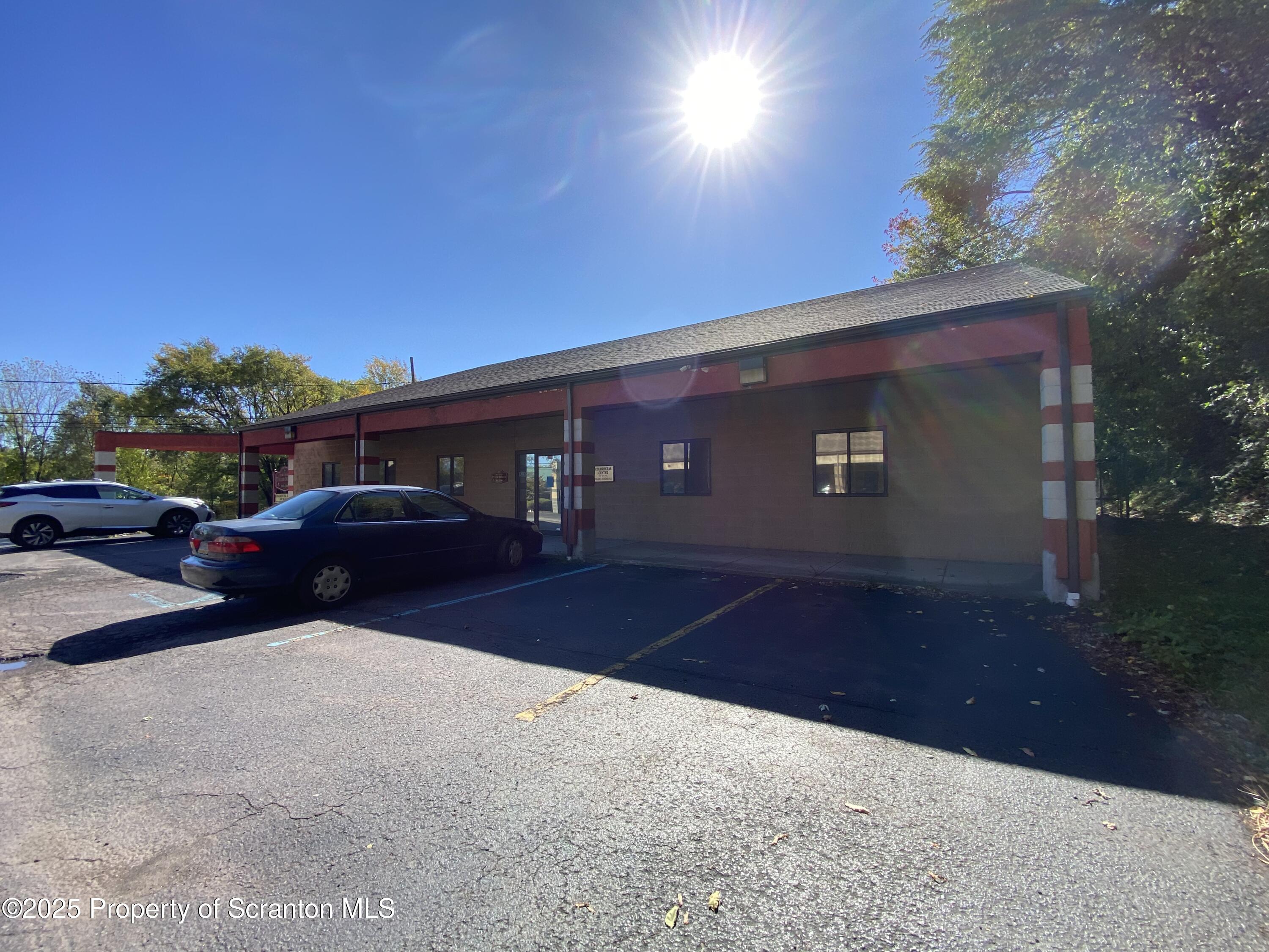 381 North 9th Avenue Scranton, PA 18504 - Photo 49 of 56 a car parked in front of a house