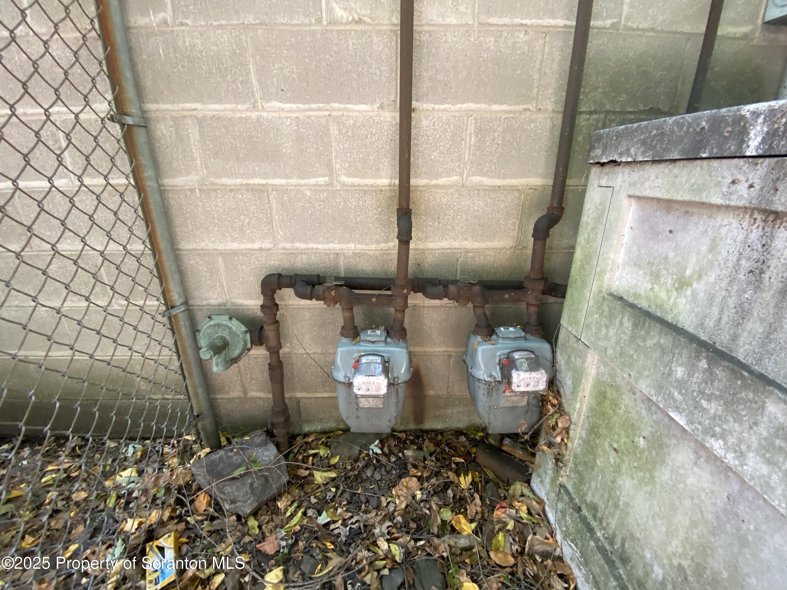 381 North 9th Avenue Scranton, PA 18504 - Photo 51 of 56 a bathroom with a toilet and a shower