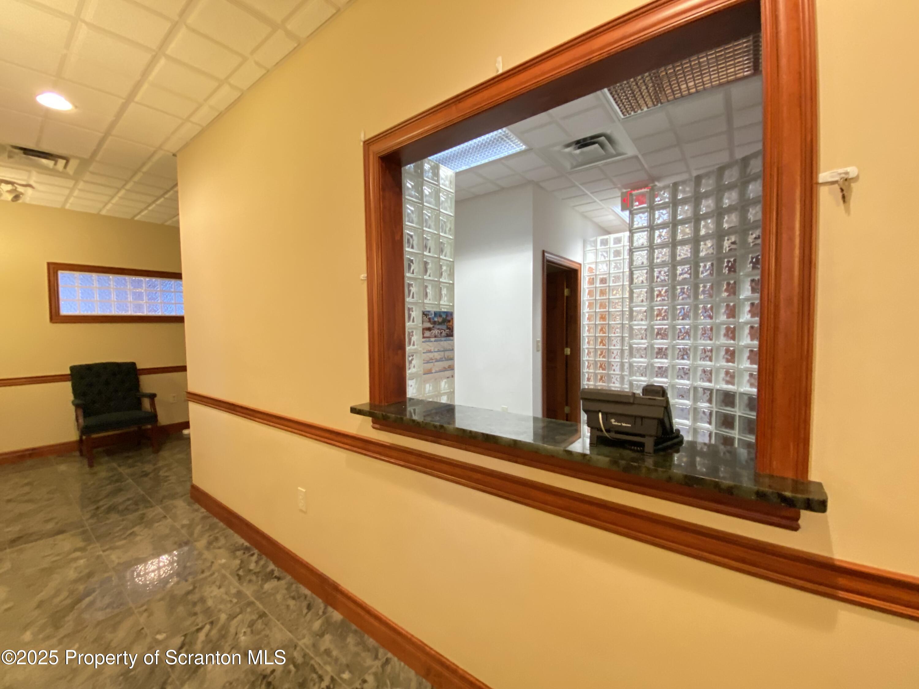 381 North 9th Avenue Scranton, PA 18504 - Photo 6 of 56 a bathroom with a sink and a mirror
