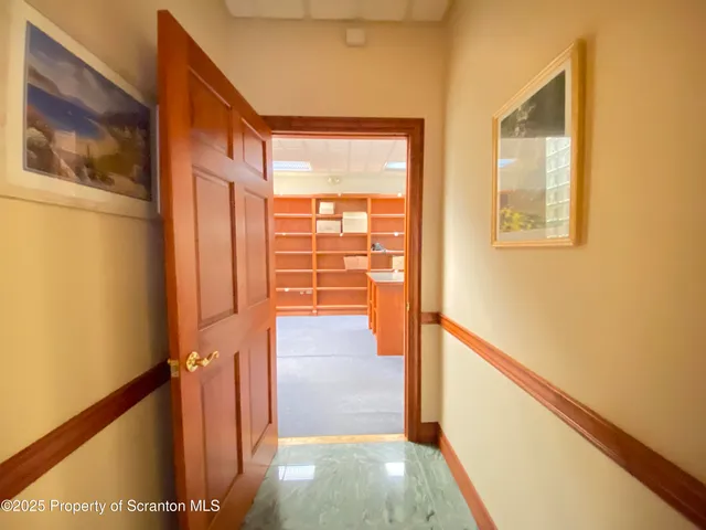 a view of a room with racks on the wall