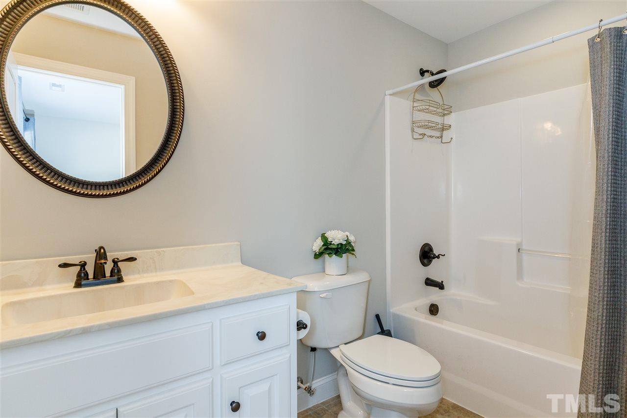 3139 Constance Circle Raleigh, NC 27603 - Photo 22 of 30 Bathroom to 3rd bedroom