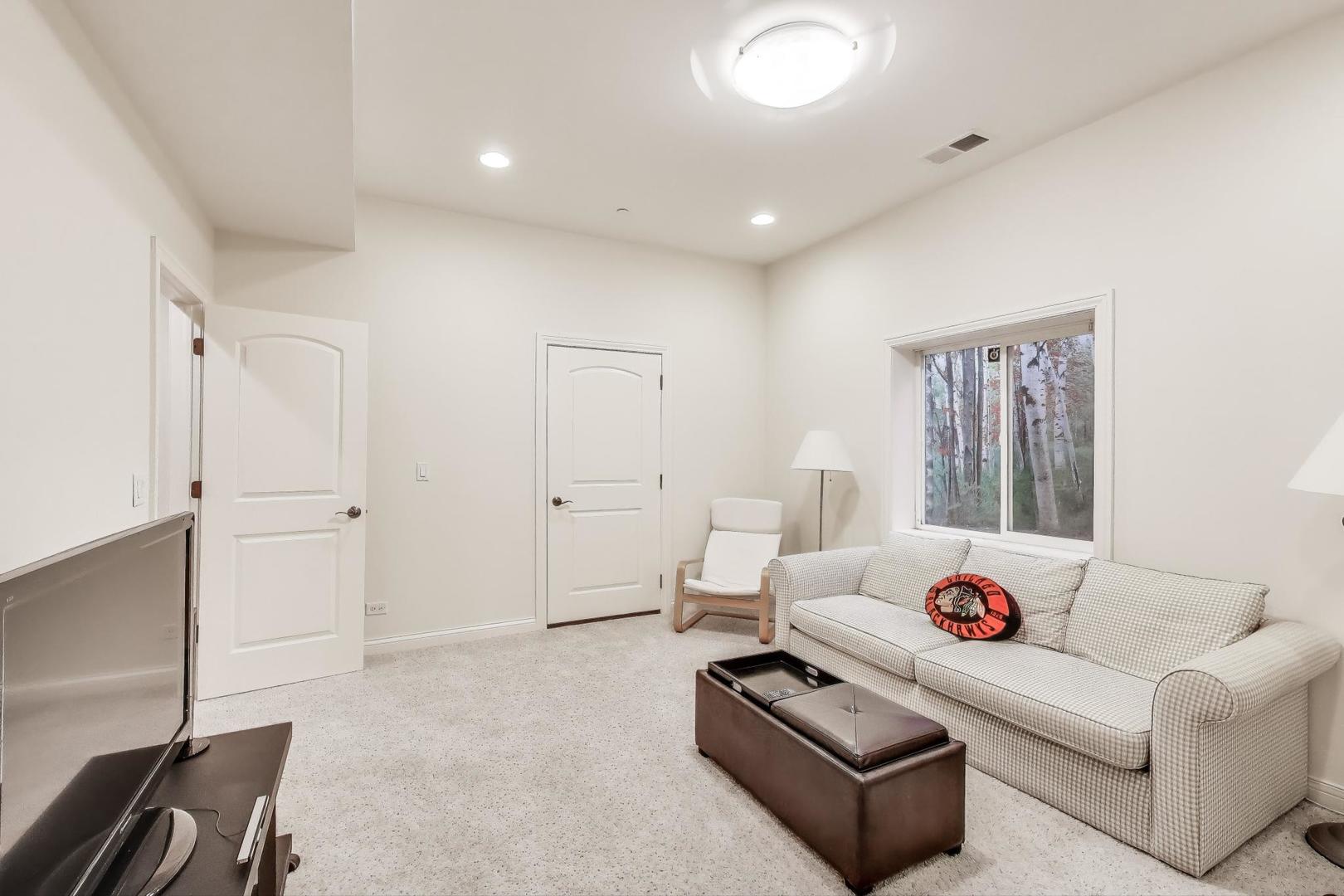 2300 Dehne Road Northbrook, IL 60062 - Photo 21 of 28 a living room with furniture and a window