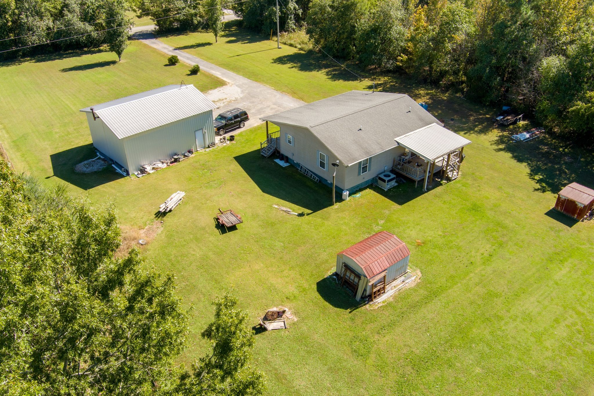 667 Maple Bend Road Winchester, TN 37398 - Photo 32 of 33 an aerial view of a house with a swimming pool