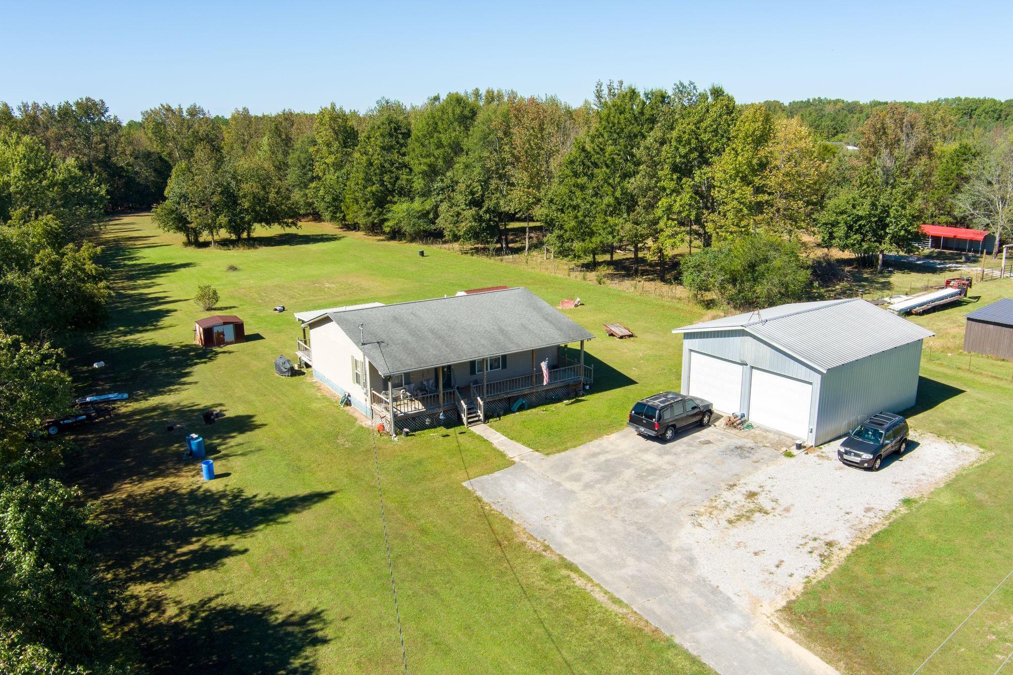 667 Maple Bend Road Winchester, TN 37398 - Photo 5 of 33 an aerial view of a house with swimming pool garden and mountain view
