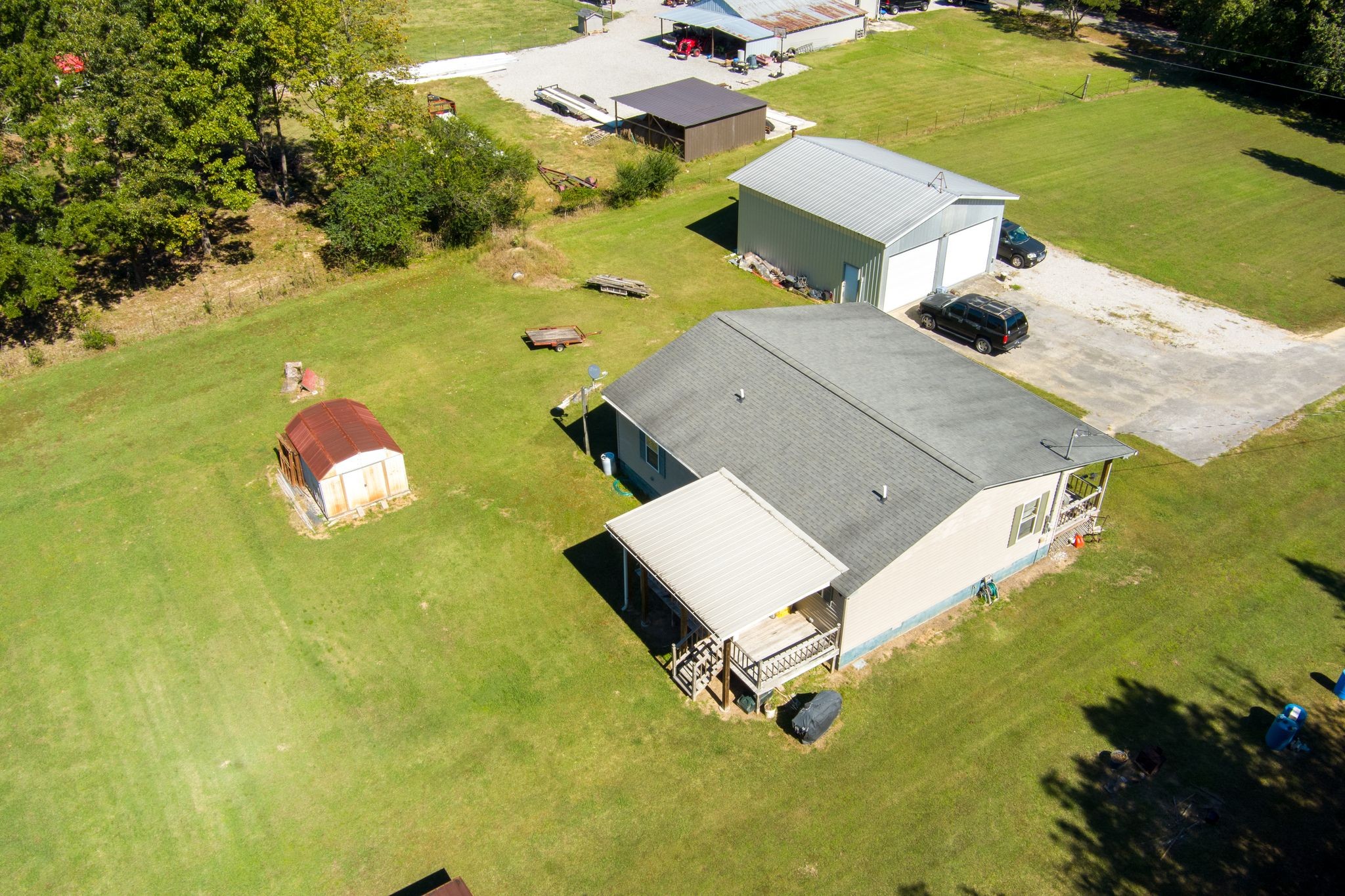 667 Maple Bend Road Winchester, TN 37398 - Photo 6 of 33 an aerial view of a house with a swimming pool yard and outdoor seating