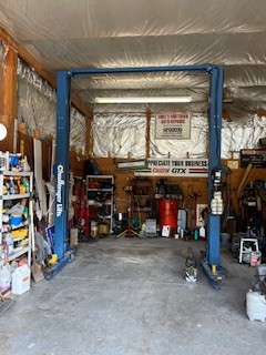 667 Maple Bend Road Winchester, TN 37398 - Photo 7 of 33 a view of a garage with rack and bicycle