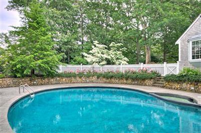414 Baxter Neck Road Marstons Mills, MA 02648 - Photo 4 of 20 a view of a swimming pool with a yard