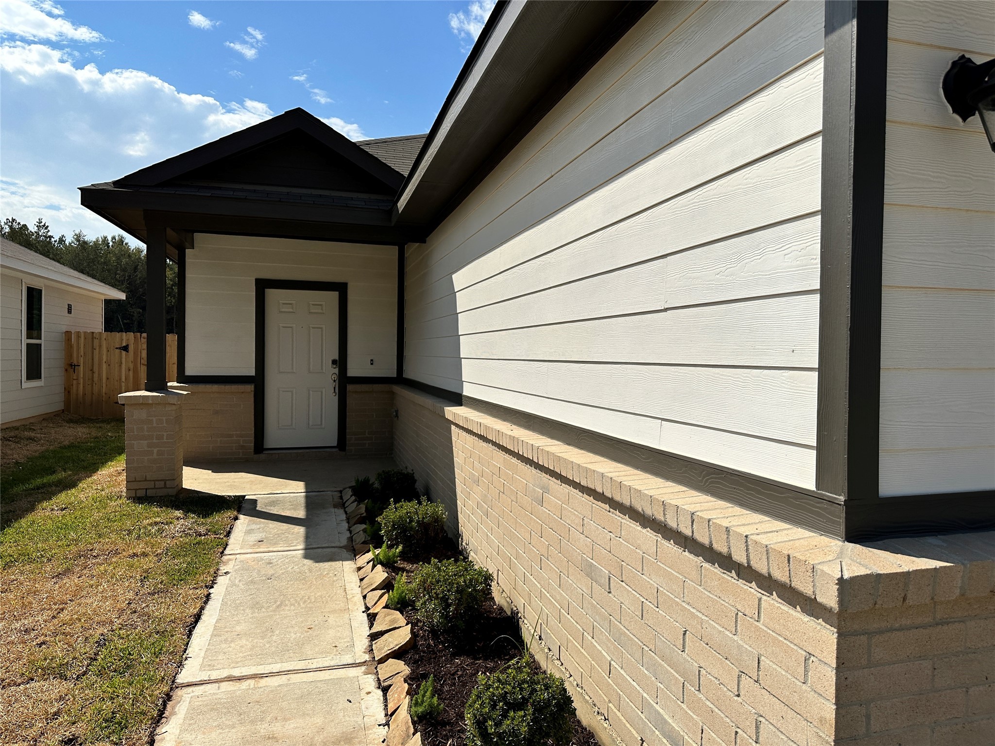 16552 Moss Lane Porter, TX 77365 - Photo 2 of 10 a backyard of a house with table and chairs