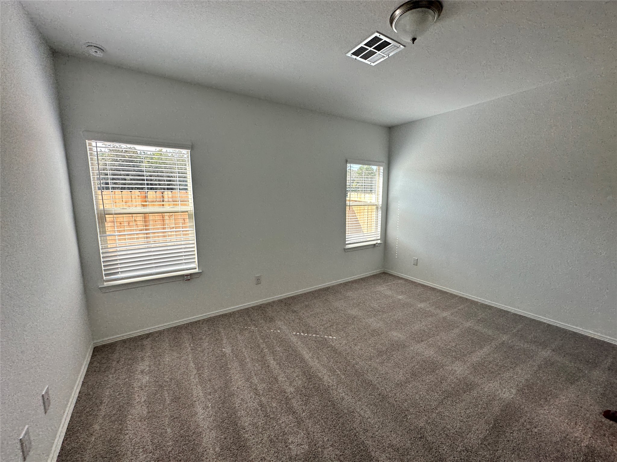 16552 Moss Lane Porter, TX 77365 - Photo 6 of 10 a view of an empty room with a window