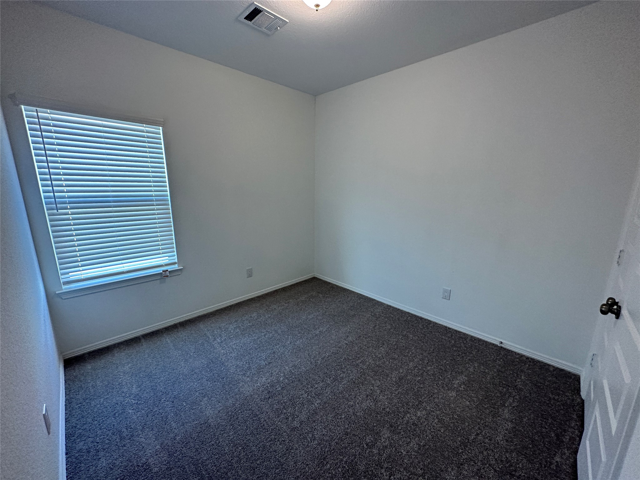 16552 Moss Lane Porter, TX 77365 - Photo 10 of 10 a view of a room that has a window in it