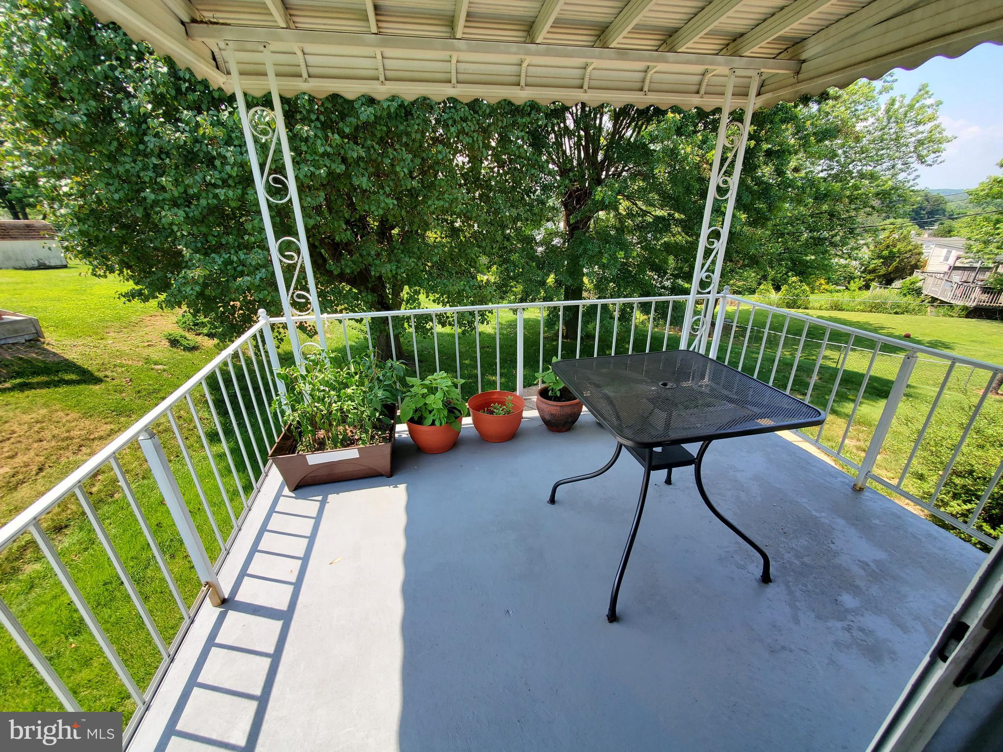 1512 Customs Road Baltimore, MD 21237 - Photo 8 of 43 a garden view with a seating space