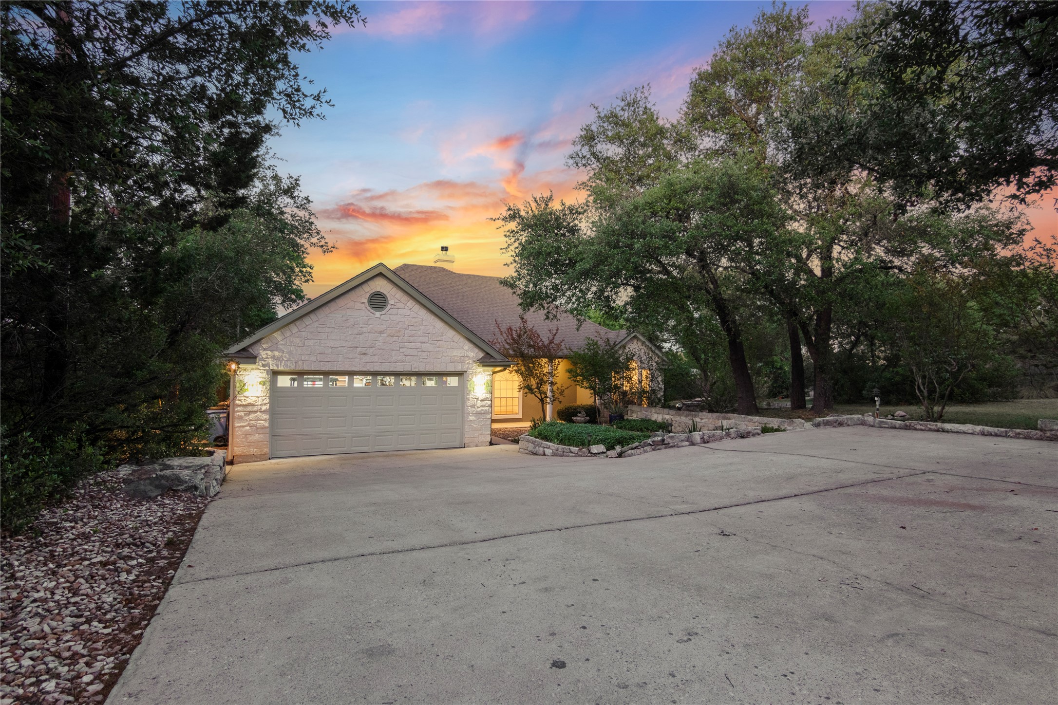 18408 West Rim Drive Jonestown, TX 78645 - Photo 27 of 30 a view of a house with a yard and large tree