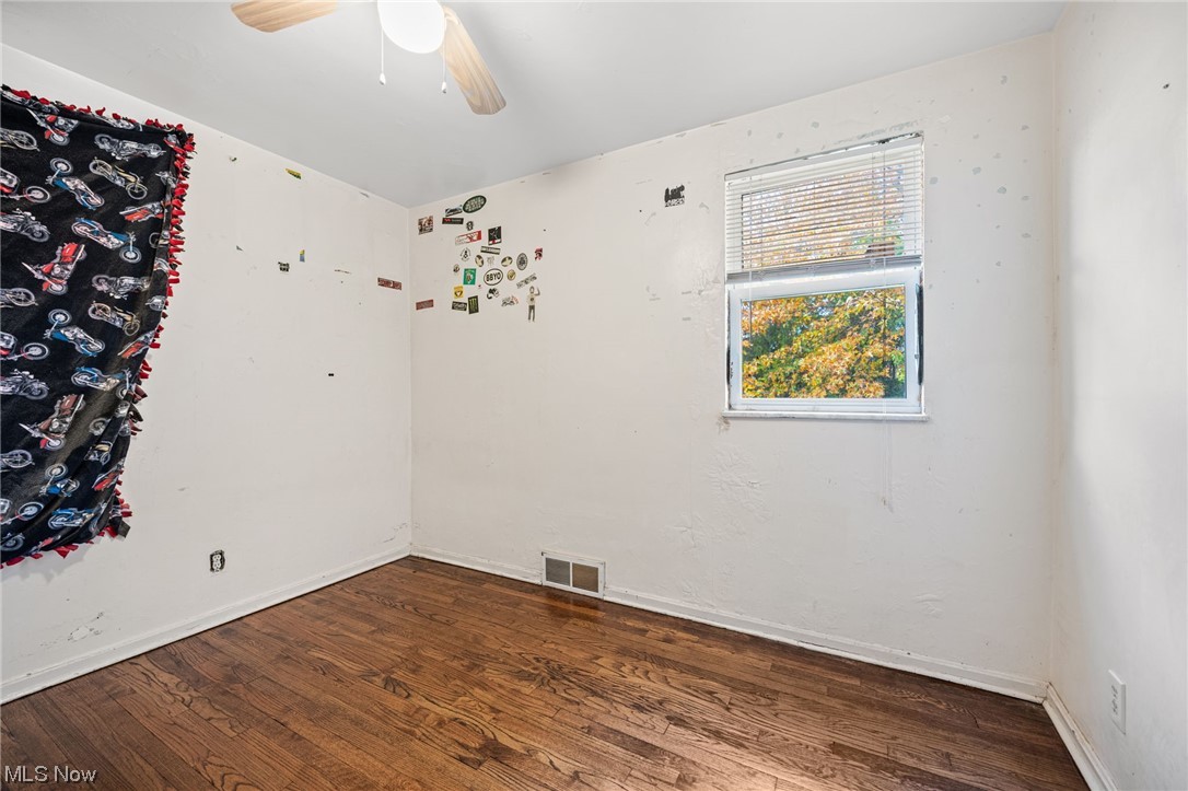 3799 Colony Road South Euclid, OH 44118 - Photo 24 of 34 Unfurnished room featuring ceiling fan and dark wood-type flooring