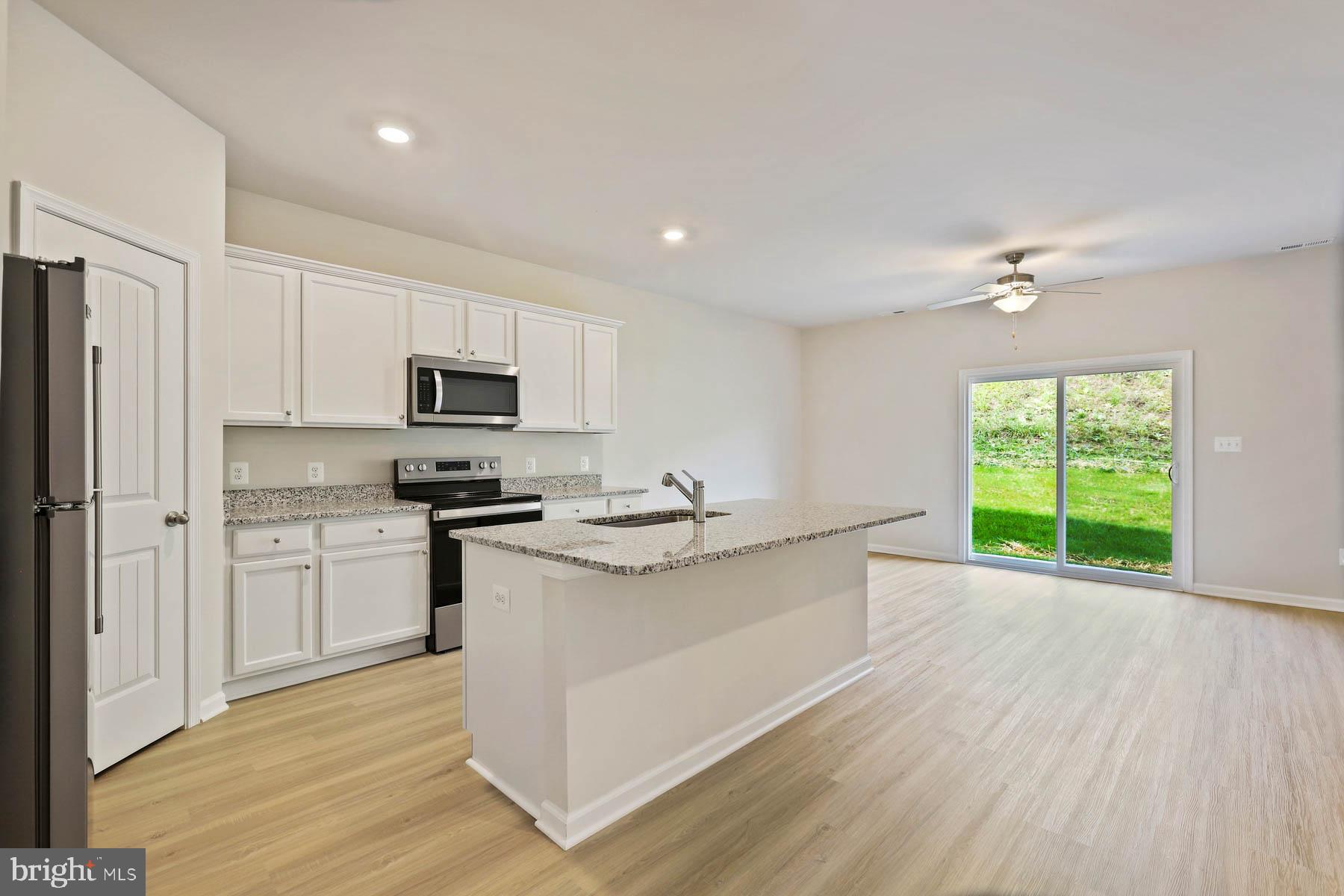 64 Paddington Street Falling Waters, WV 25419 - Photo 2 of 10 Stainless Steel Whirlpool appliances included!