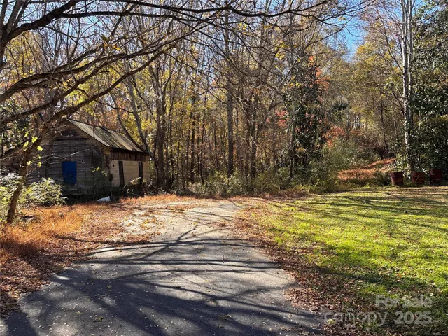a view of pool and snow on the road