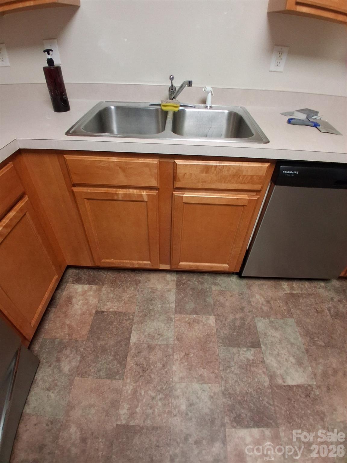 443 Tranquil Lane Willow Spring, NC 27592 - Photo 7 of 21 a view of a kitchen with a sink and dishwasher