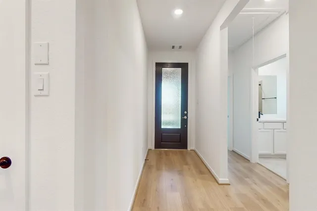 a view of a bathroom with a bathtub