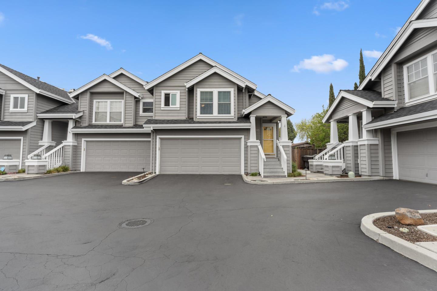 a view of a house with a street