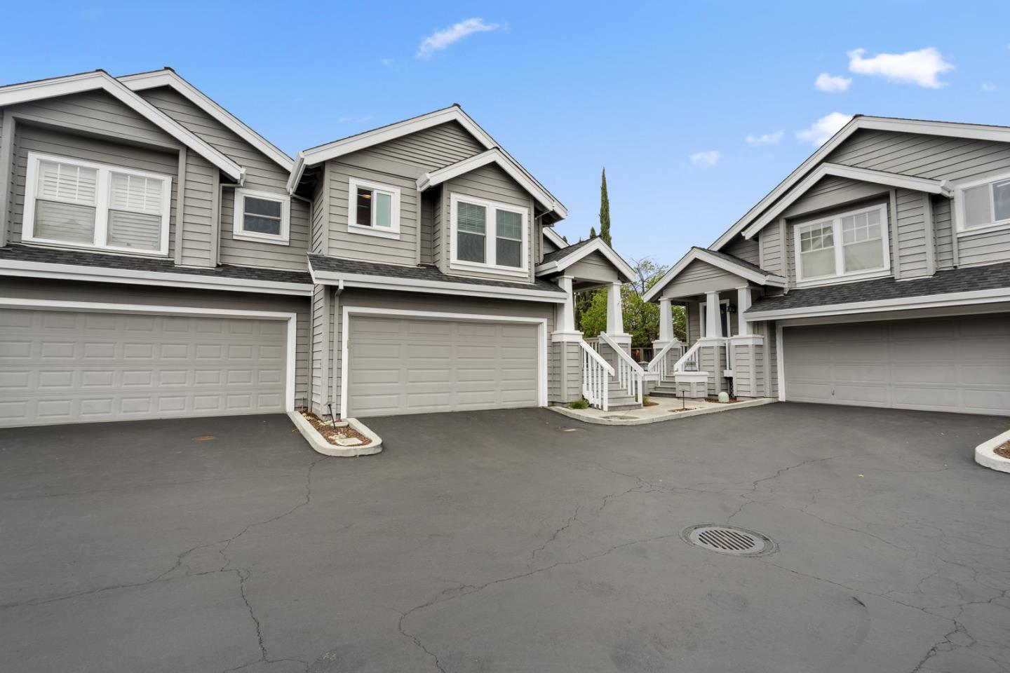 113 East Rincon Avenue Campbell, CA 95008 - Photo 2 of 26 a front view of a house with garage