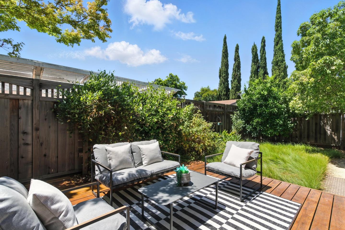 113 East Rincon Avenue Campbell, CA 95008 - Photo 23 of 26 a view of a backyard with couches chairs and a potted plant