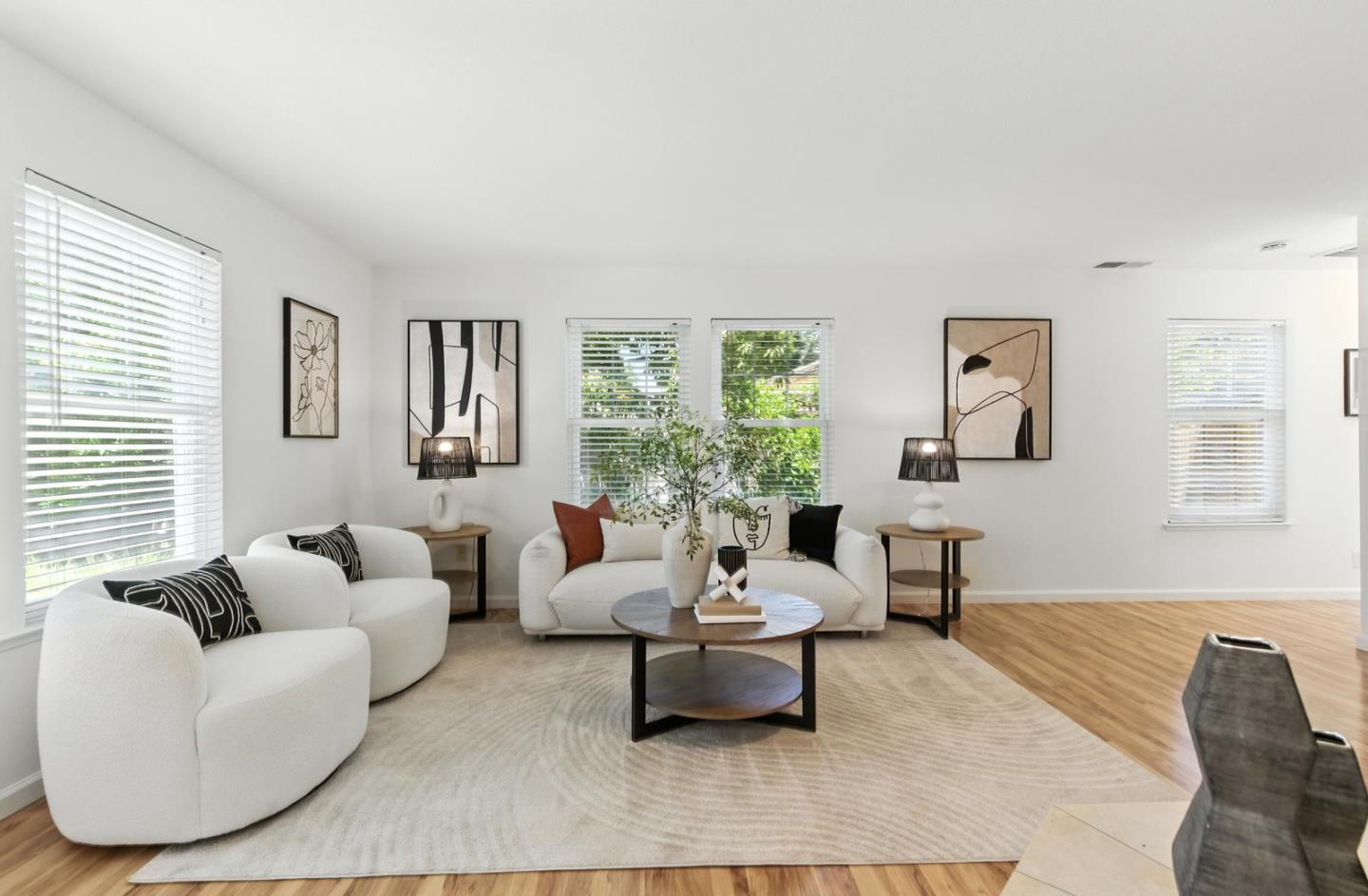 113 East Rincon Avenue Campbell, CA 95008 - Photo 3 of 26 a living room with furniture and a large window