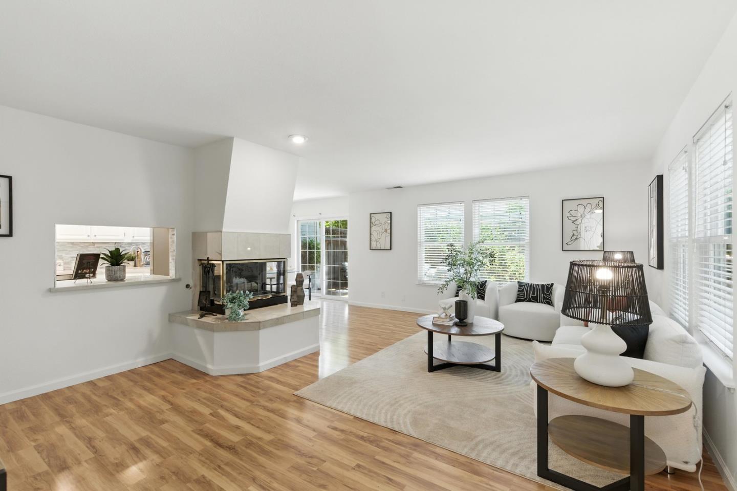 113 East Rincon Avenue Campbell, CA 95008 - Photo 5 of 26 a living room with furniture and a wooden floor