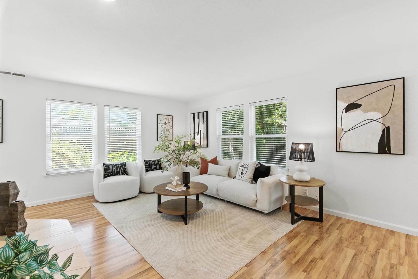 113 East Rincon Avenue Campbell, CA 95008 - Photo 6 of 26 a living room with furniture and a large window