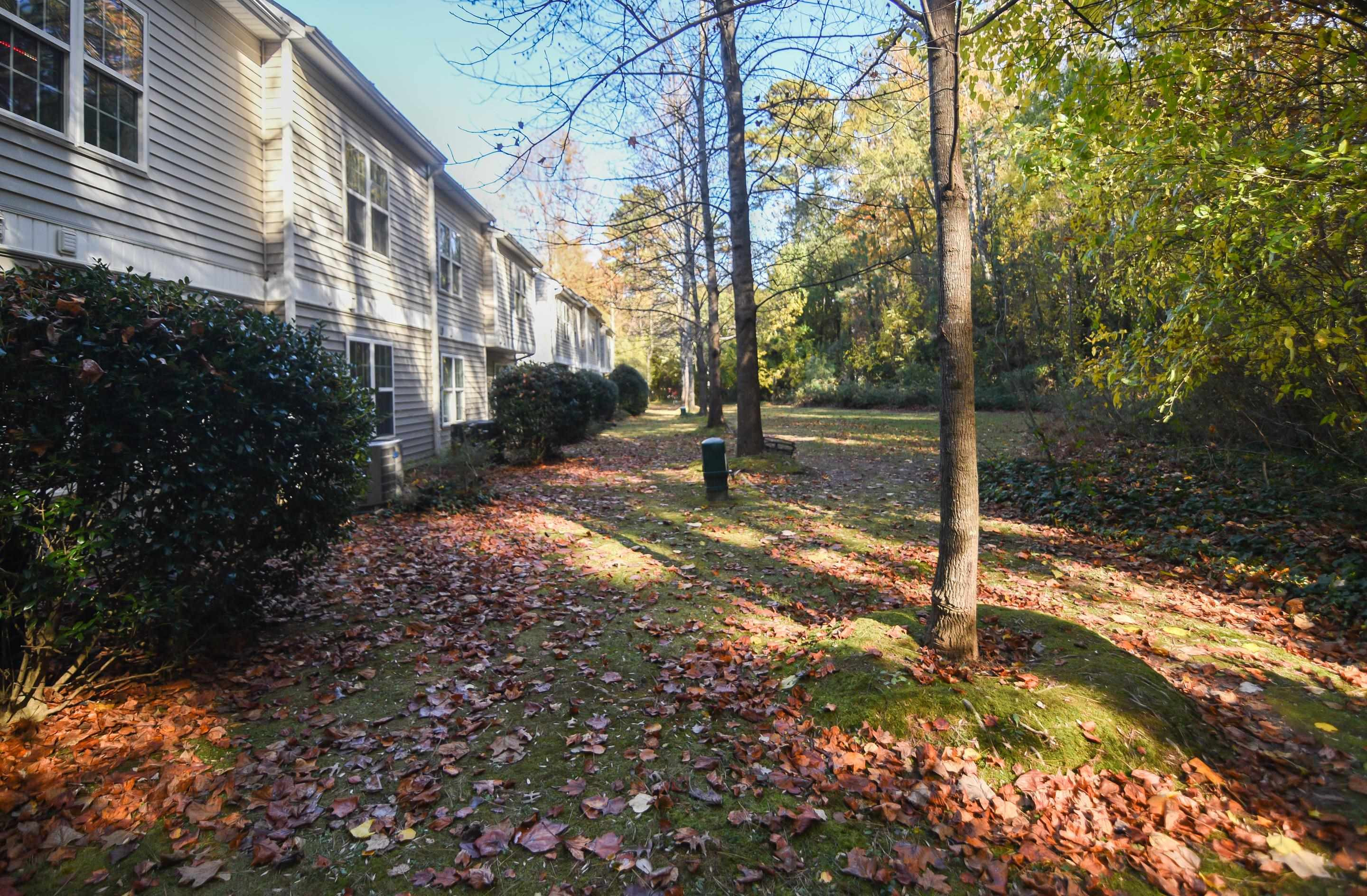69 Red Lane Raleigh, NC 27606 - Photo 16 of 18 Unlike some townhomes, this one does not backup to others thus offering nice, private views. Exterior Back