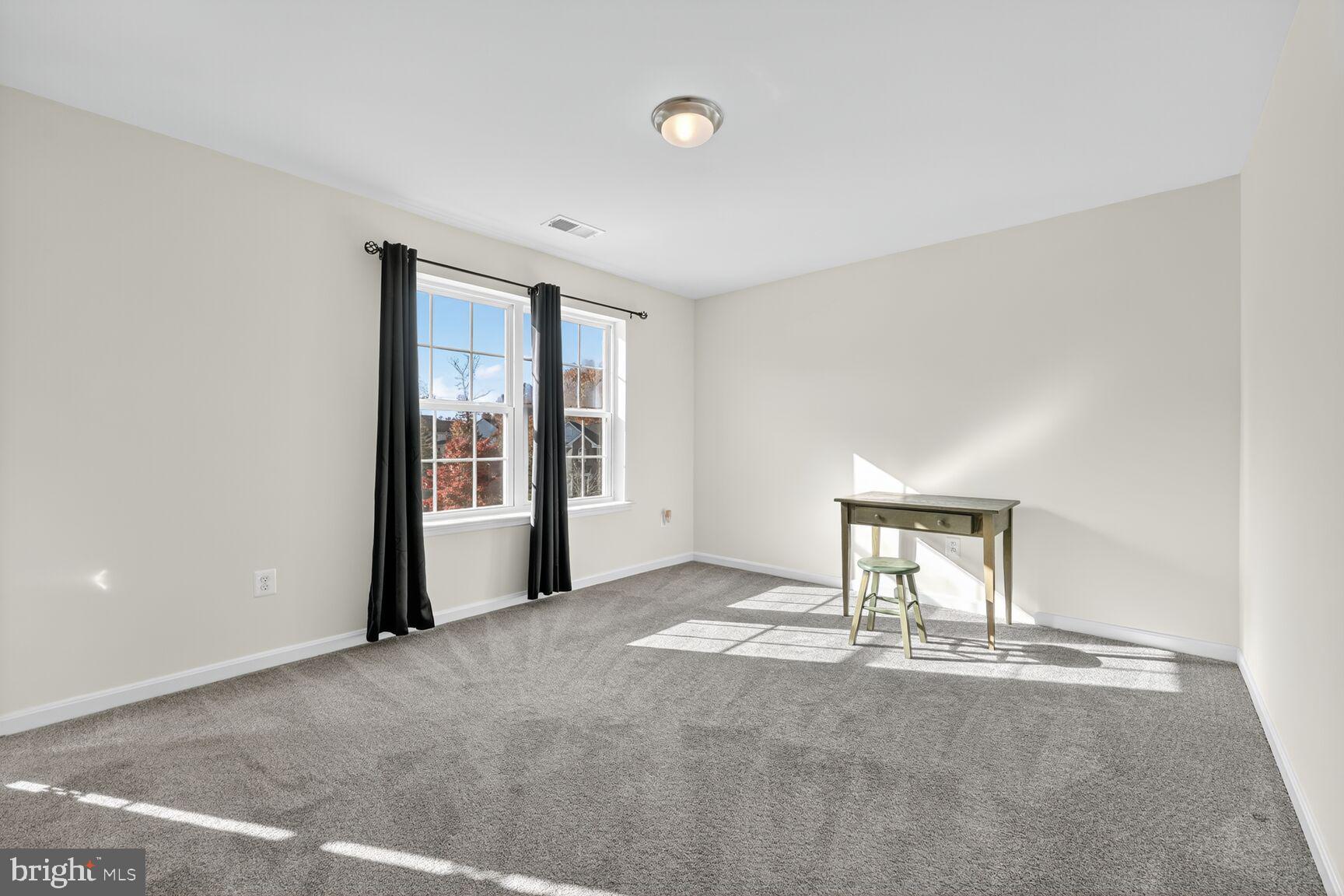 711 Yarrow Court Accokeek, MD 20607 - Photo 23 of 40 a view of an empty room with a window