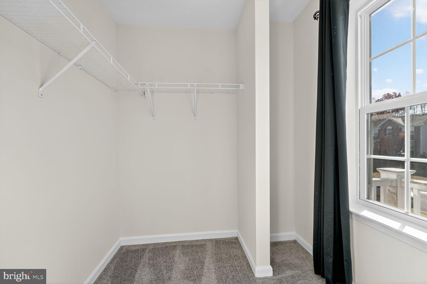 711 Yarrow Court Accokeek, MD 20607 - Photo 24 of 40 a view of walk in closet with empty racks