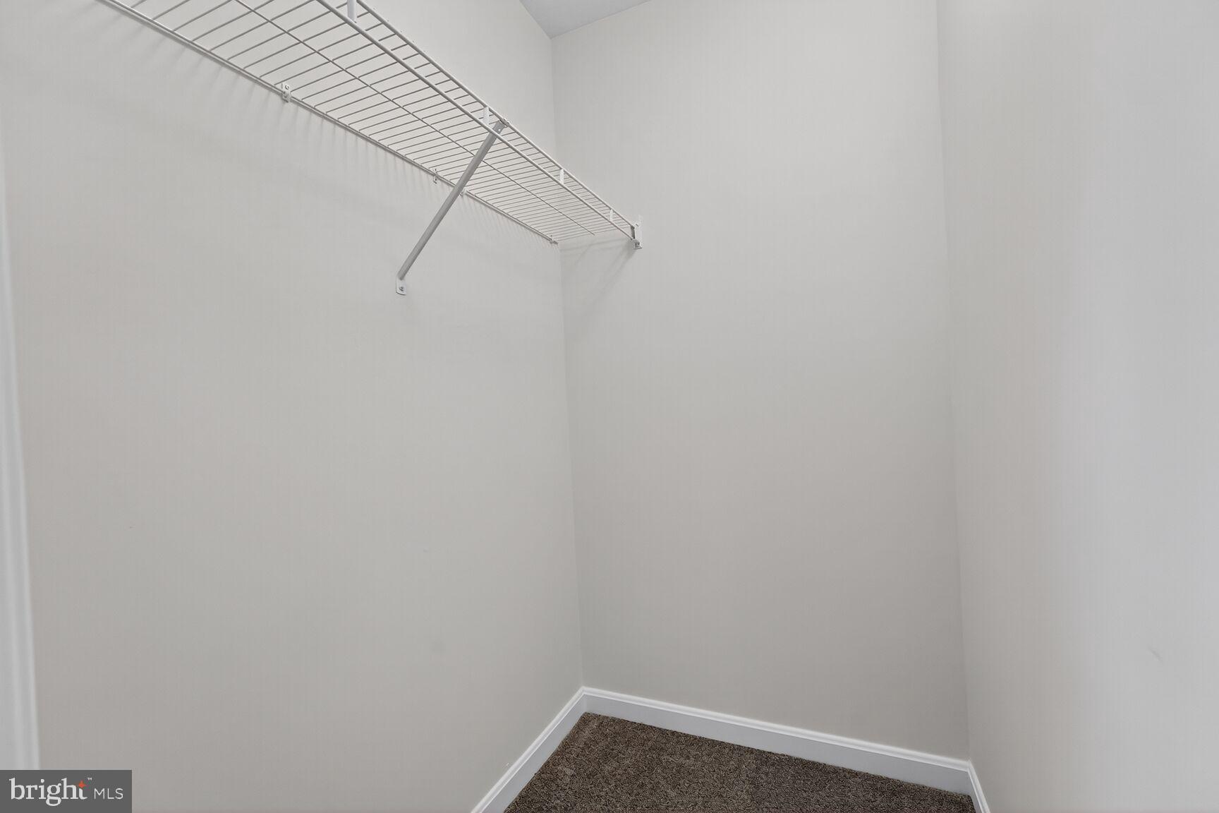 711 Yarrow Court Accokeek, MD 20607 - Photo 25 of 40 a view of small space with racks on the wall