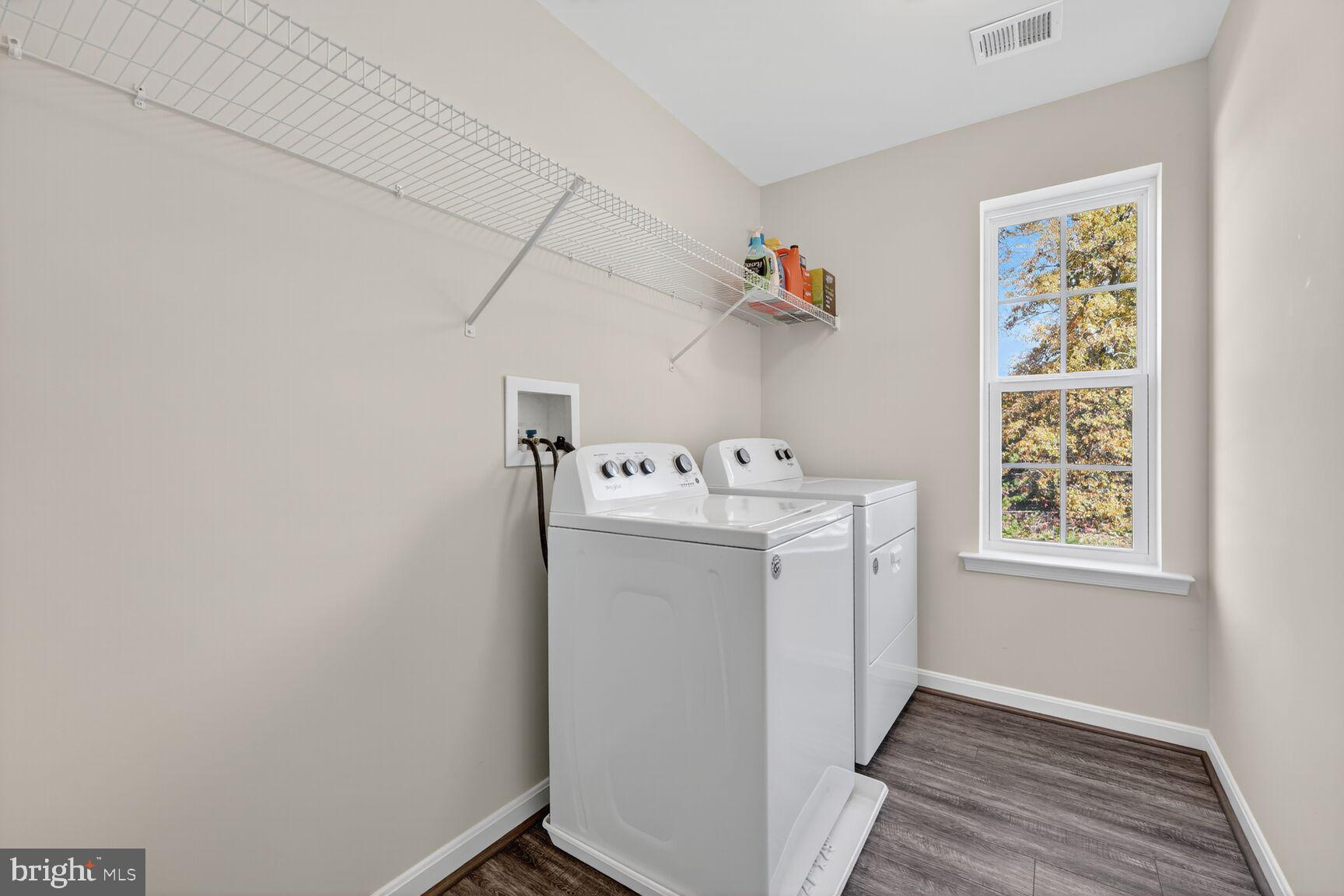 711 Yarrow Court Accokeek, MD 20607 - Photo 27 of 40 a utility room with dryer and washer