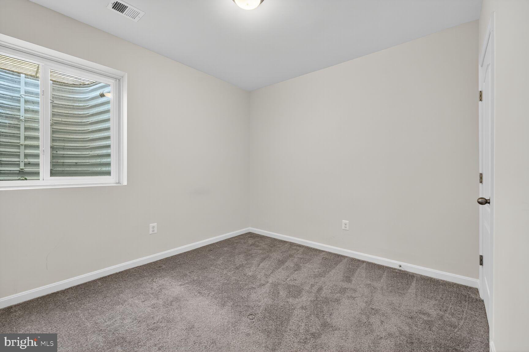 711 Yarrow Court Accokeek, MD 20607 - Photo 33 of 40 a view of an empty room with a window