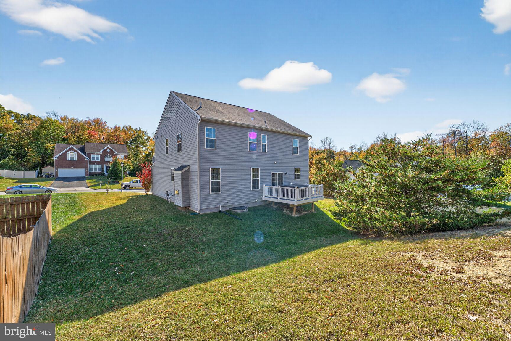 711 Yarrow Court Accokeek, MD 20607 - Photo 36 of 40 a view of a house with a backyard