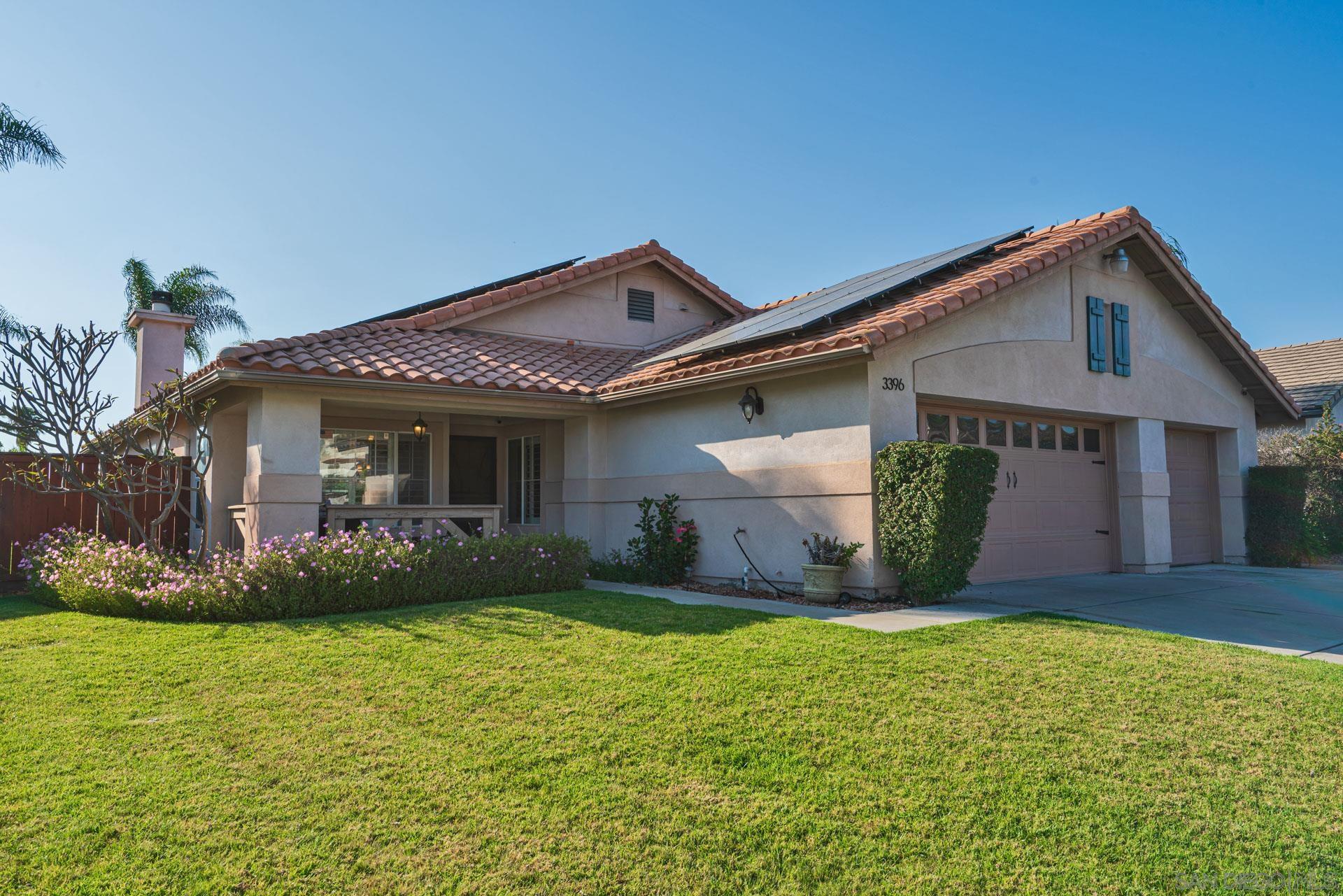 3396 Monique Lane Spring Valley, CA 91977 - Photo 12 of 31 a front view of a house with garden