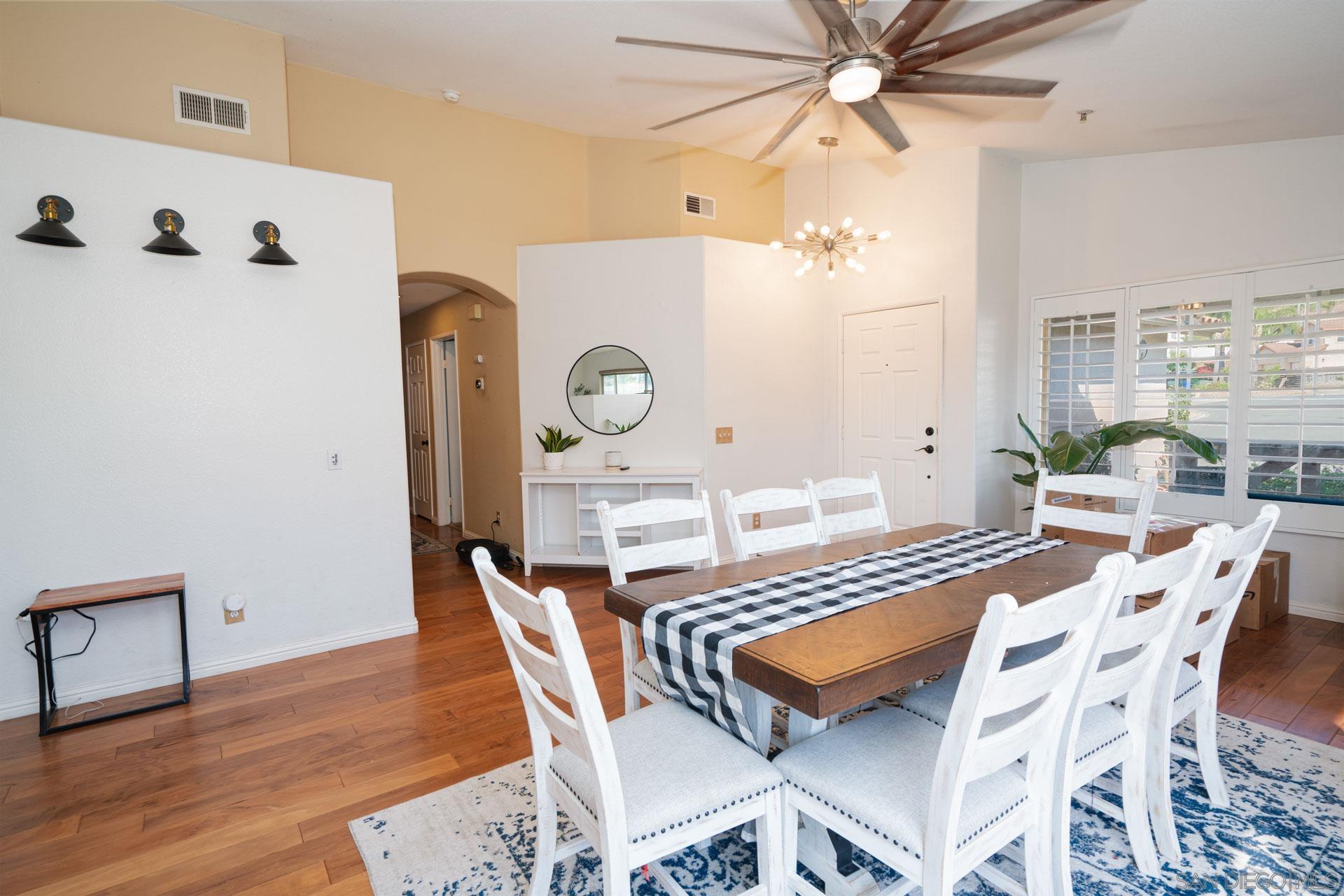3396 Monique Lane Spring Valley, CA 91977 - Photo 17 of 31 a dining room with furniture and window