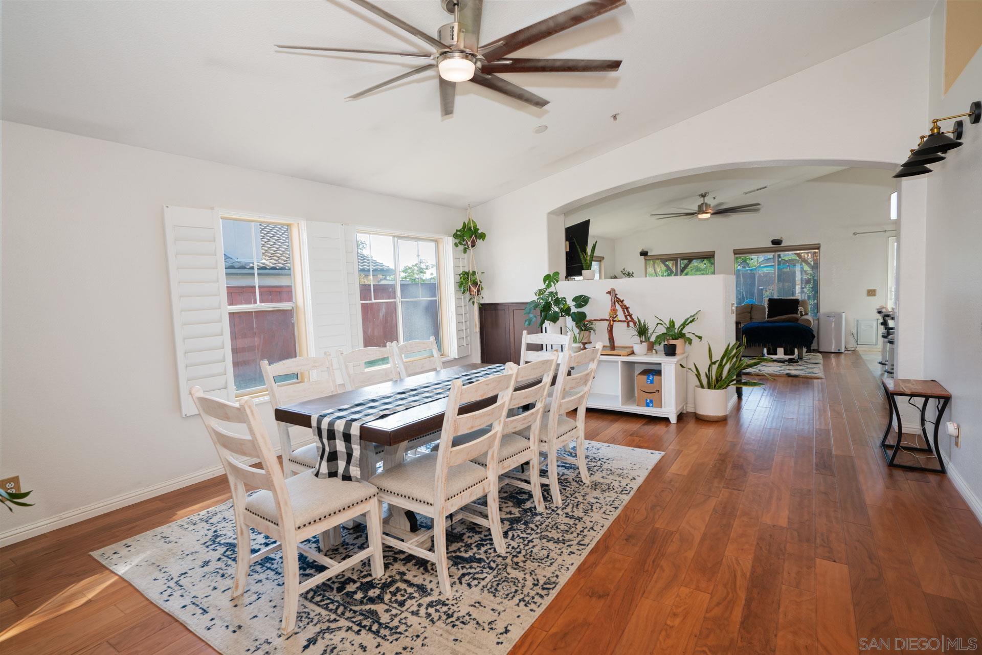 3396 Monique Lane Spring Valley, CA 91977 - Photo 21 of 31 a view of a dining room with furniture window and wooden floor
