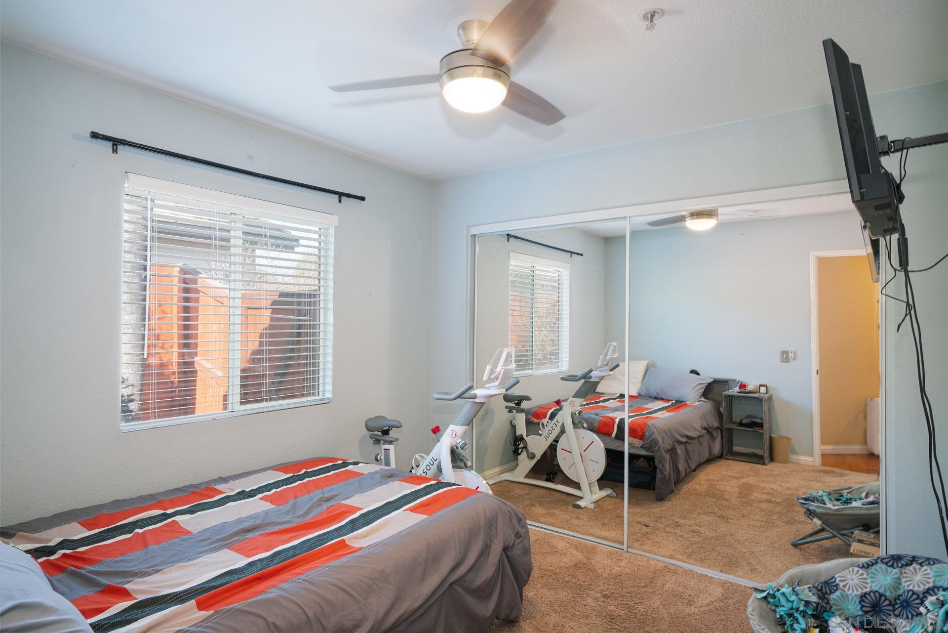 3396 Monique Lane Spring Valley, CA 91977 - Photo 4 of 31 a bedroom with bed and a window